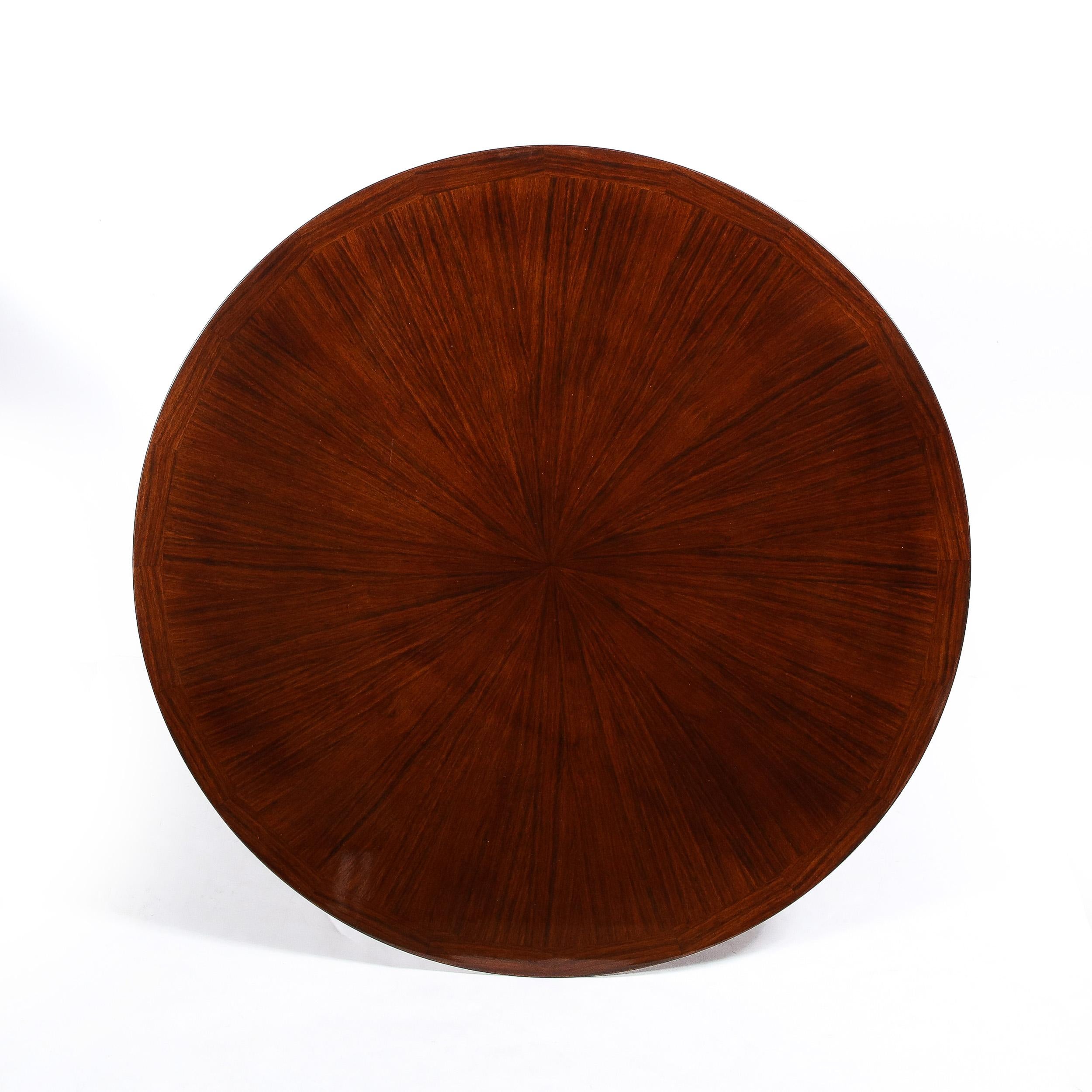 This stunning Art Deco Starburst Design Bookmatched Walnut Occasional Table by Jules Leleu originates from France, Circa 1930. A round topped beautifully proportioned occasional table featuring a book-matched starburst motif lined with a highly