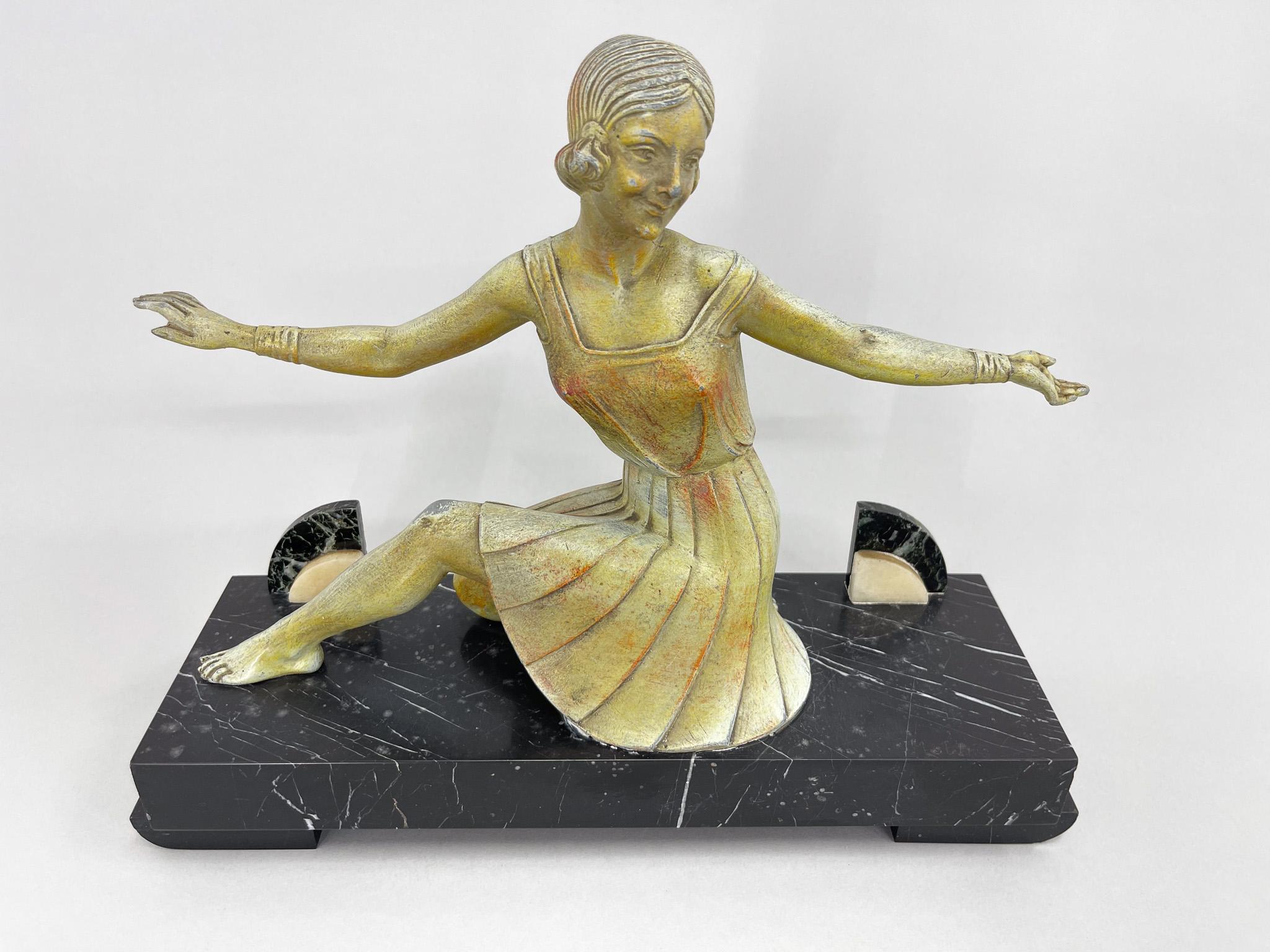 Beautiful art deco sculpture signed by Charles Henri Molins. The sculpture is signed by the author in the corner of the marble base.