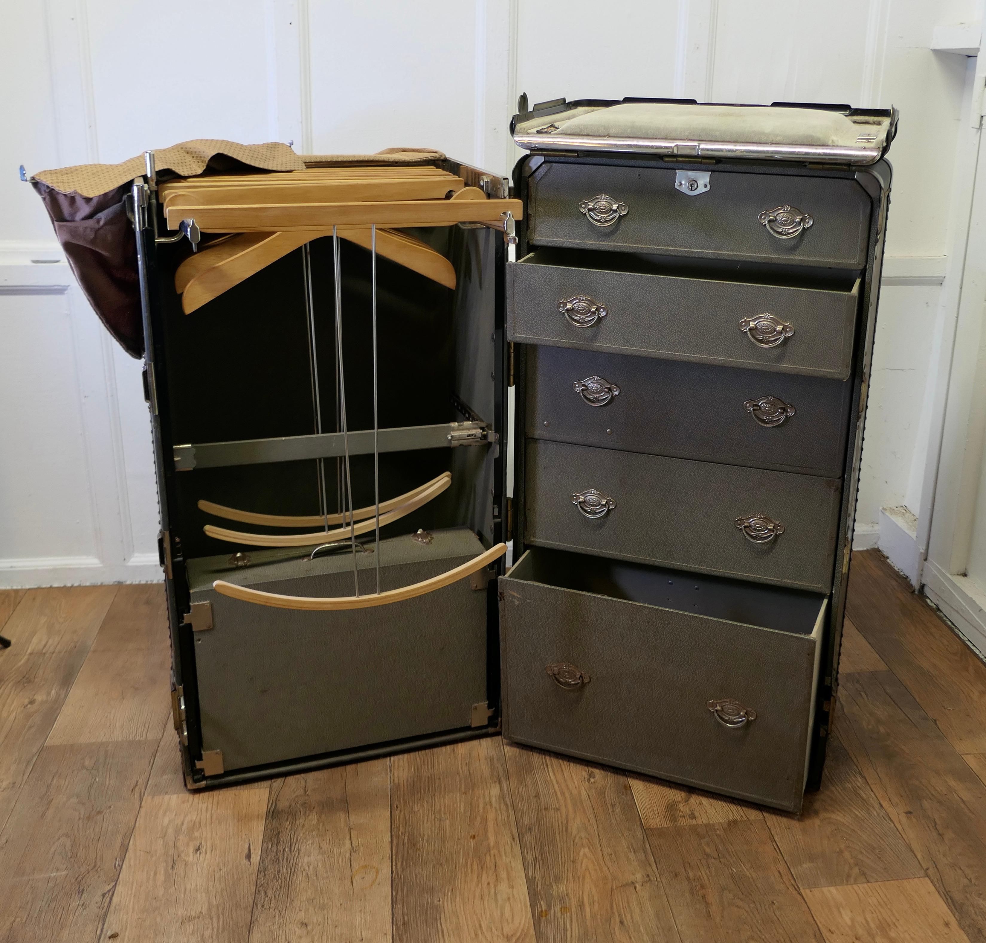 Art Deco Steamer Trunk or Cabin Wardrobe by Hartman Luggage Co.

Early 20th Century Estate Wardrobe Trunk from Beckets Leather Goods Company Washington DC
The trunk is complete it opens out fully to access 5 drawers on one side and a wardrobe