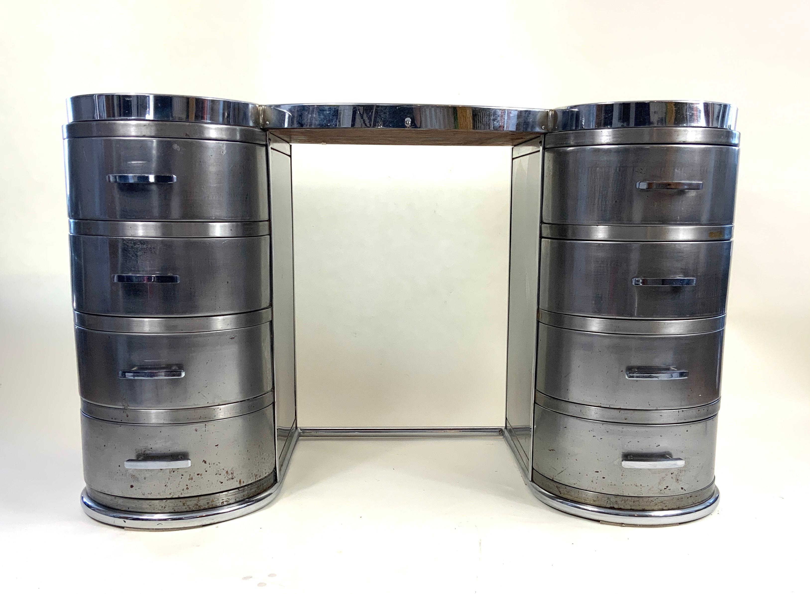 A wonderful Art Deco dressing table from the 1930’s - 1940’s attributed to the Hawker Aircraft Co., which, besides manufacturing aircraft, produced furniture for RAF bases across Europe.

It is made entirely from steel and chromed steel for the