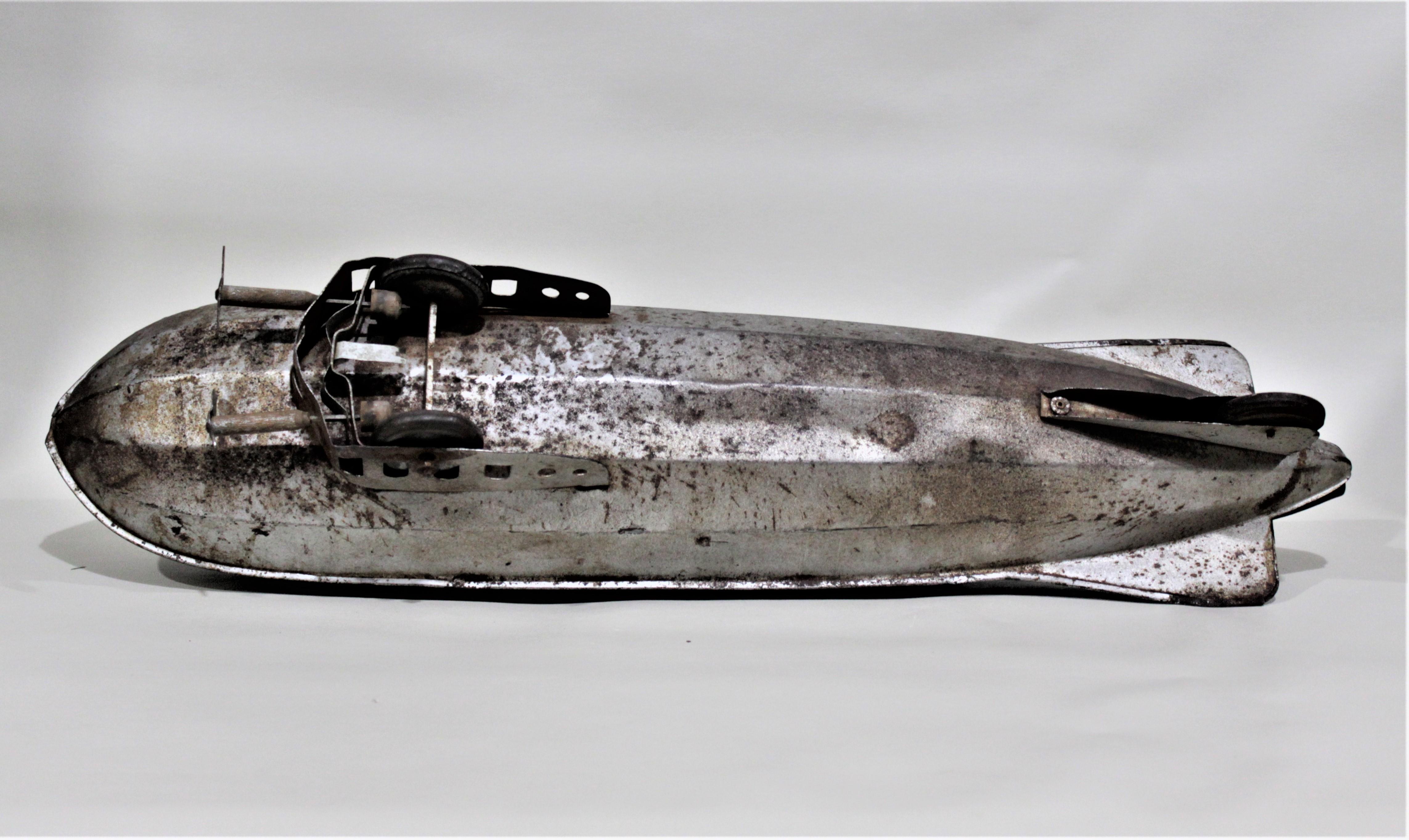American Art Deco Steelcraft Metal Pull Toy, the 'Little Giant Zeppelin' For Sale
