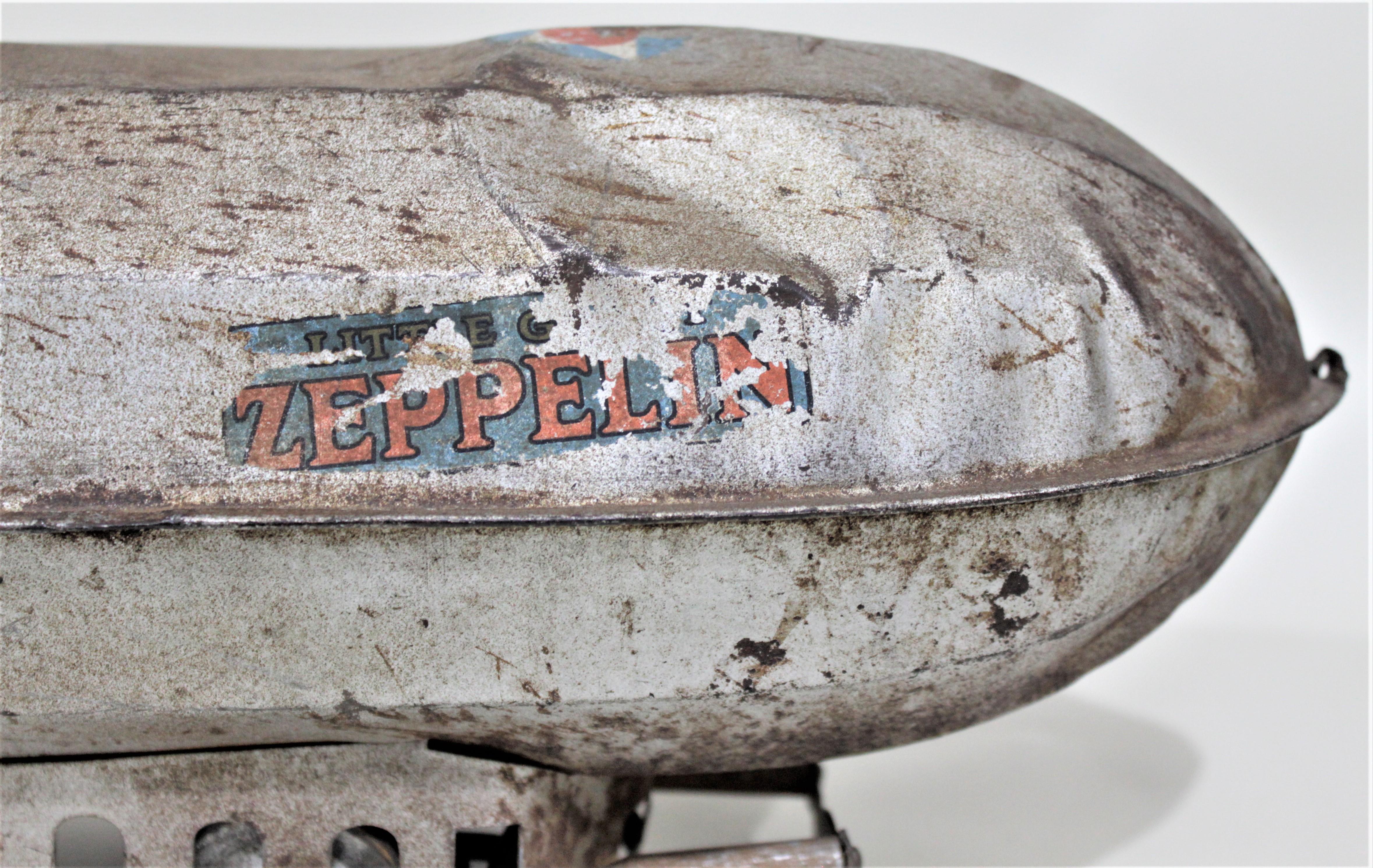 20th Century Art Deco Steelcraft Metal Pull Toy, the 'Little Giant Zeppelin' For Sale