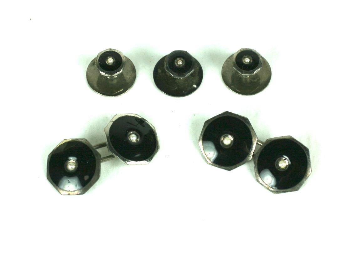 Art Deco Sterling and Enamel Stud Set from the 1930's. This is a 5 piece set with the addition of 4 jet vest buttons (which are from an earlier period) and which came with the box. 
These can be worn all together and probably were. The cufflinks and