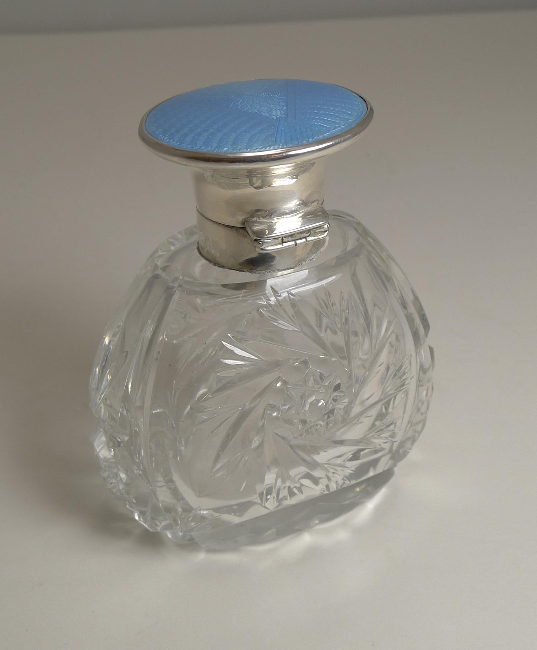 cologne blue bottle silver top