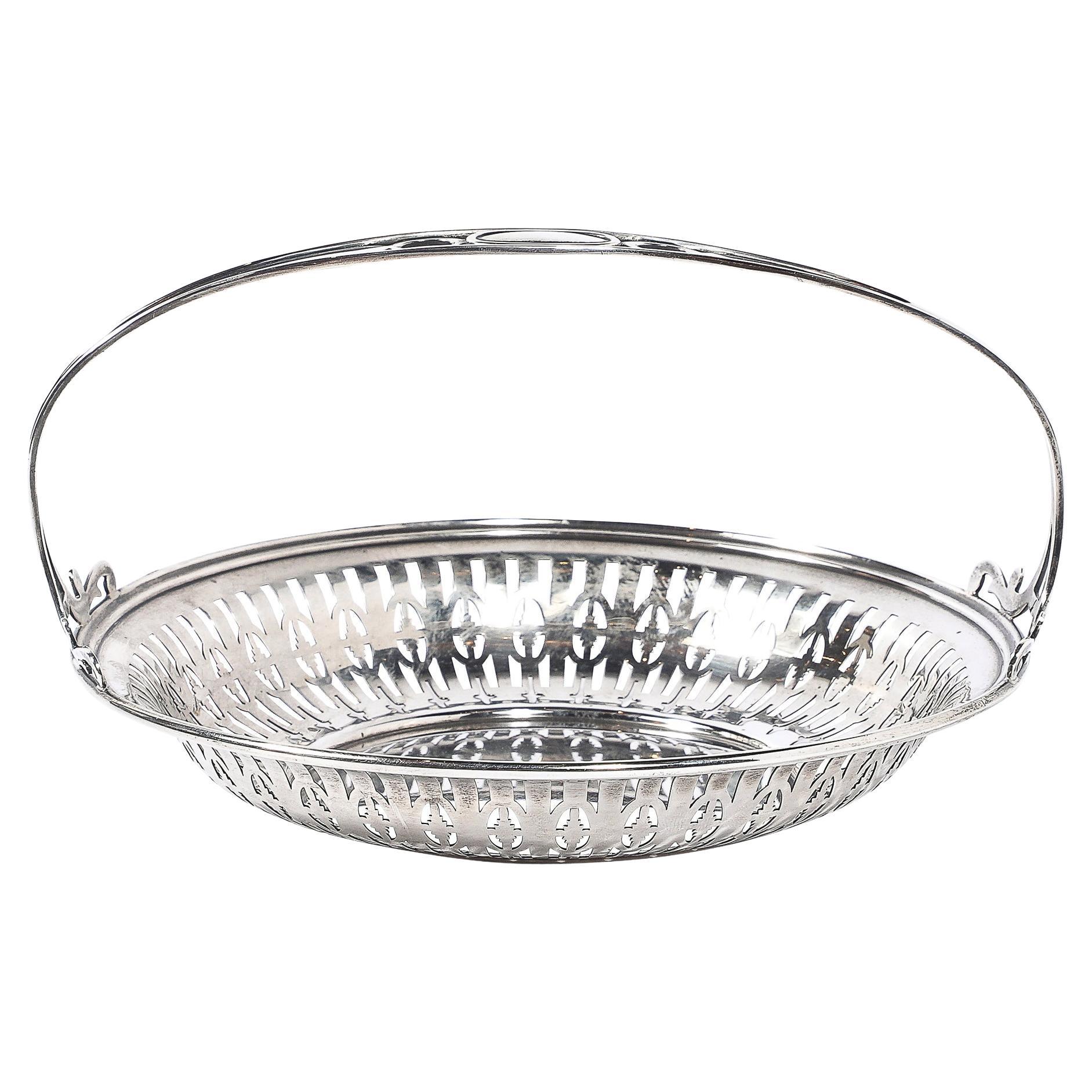 Art Deco Sterling Silver Basket w/ Cutout Detailing
Handle signed J E Caldwell
