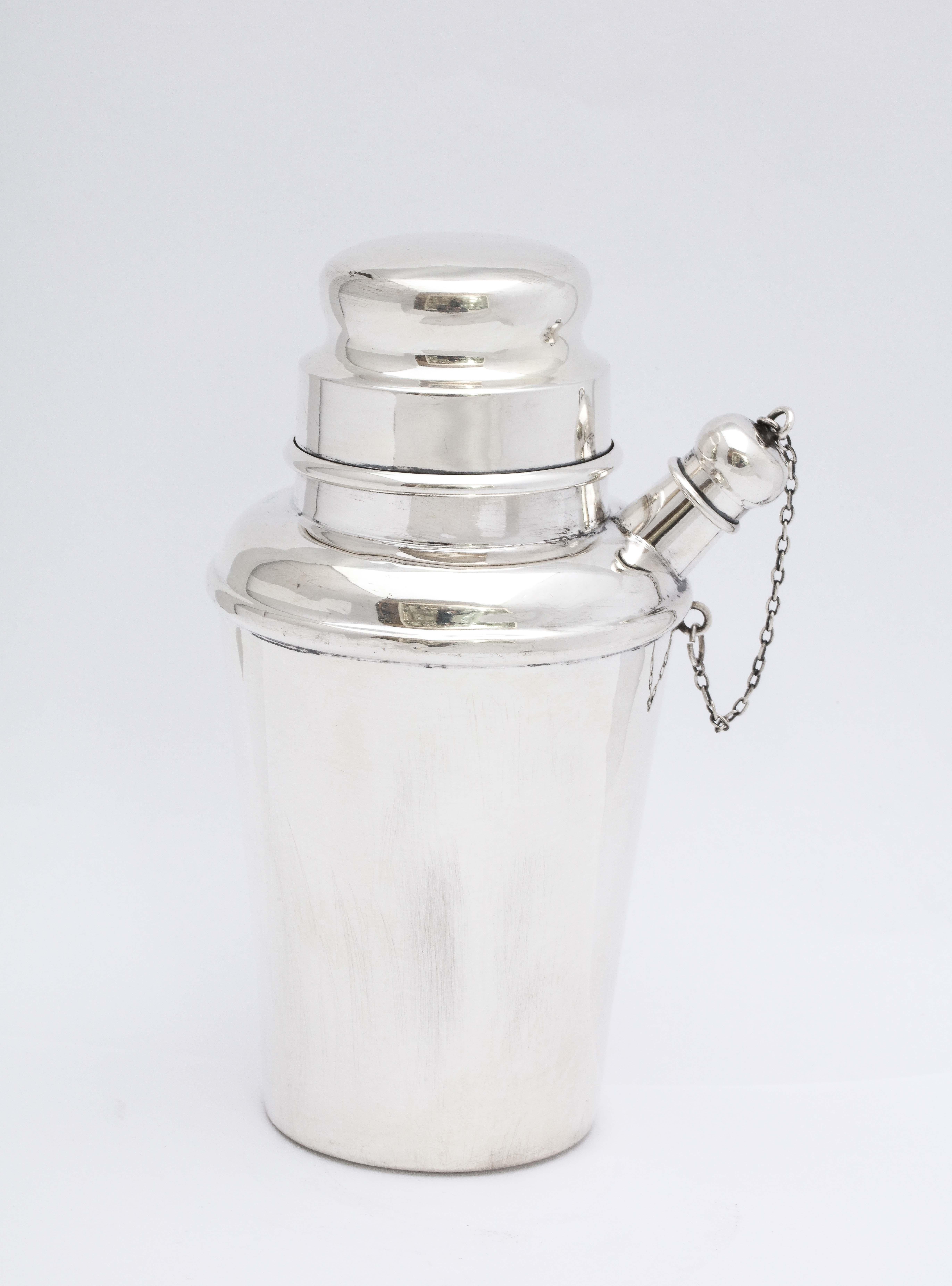 Art Deco, sterling silver cocktail shaker, Currier and Roby, New York, Ca. 1930's. Measures 5 3/4 inches high x 3 1.4 diameter at widest point x 4 inches wide from outside edge of spout to outside edge of shaker. Weighs 4.760 troy ounces. There are