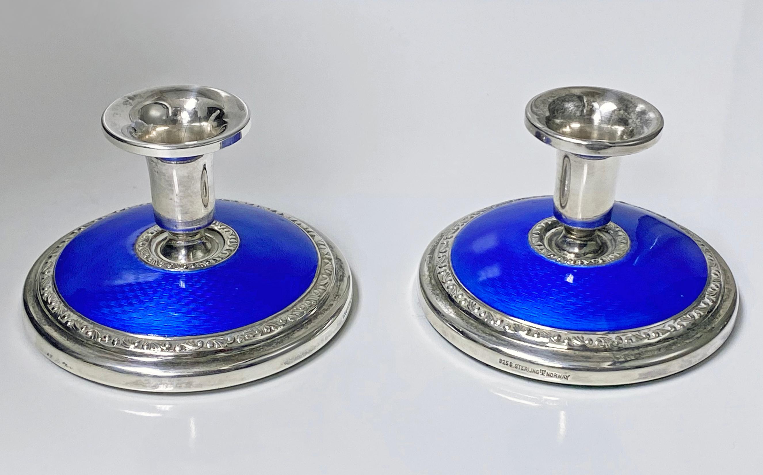 Pair of Art Deco sterling silver enamel travel desk candlesticks, Norway, circa1930, Norsk Filigranskfabrikk. The candlesticks with vibrant blue guilloche enamel. Dimensions: 2