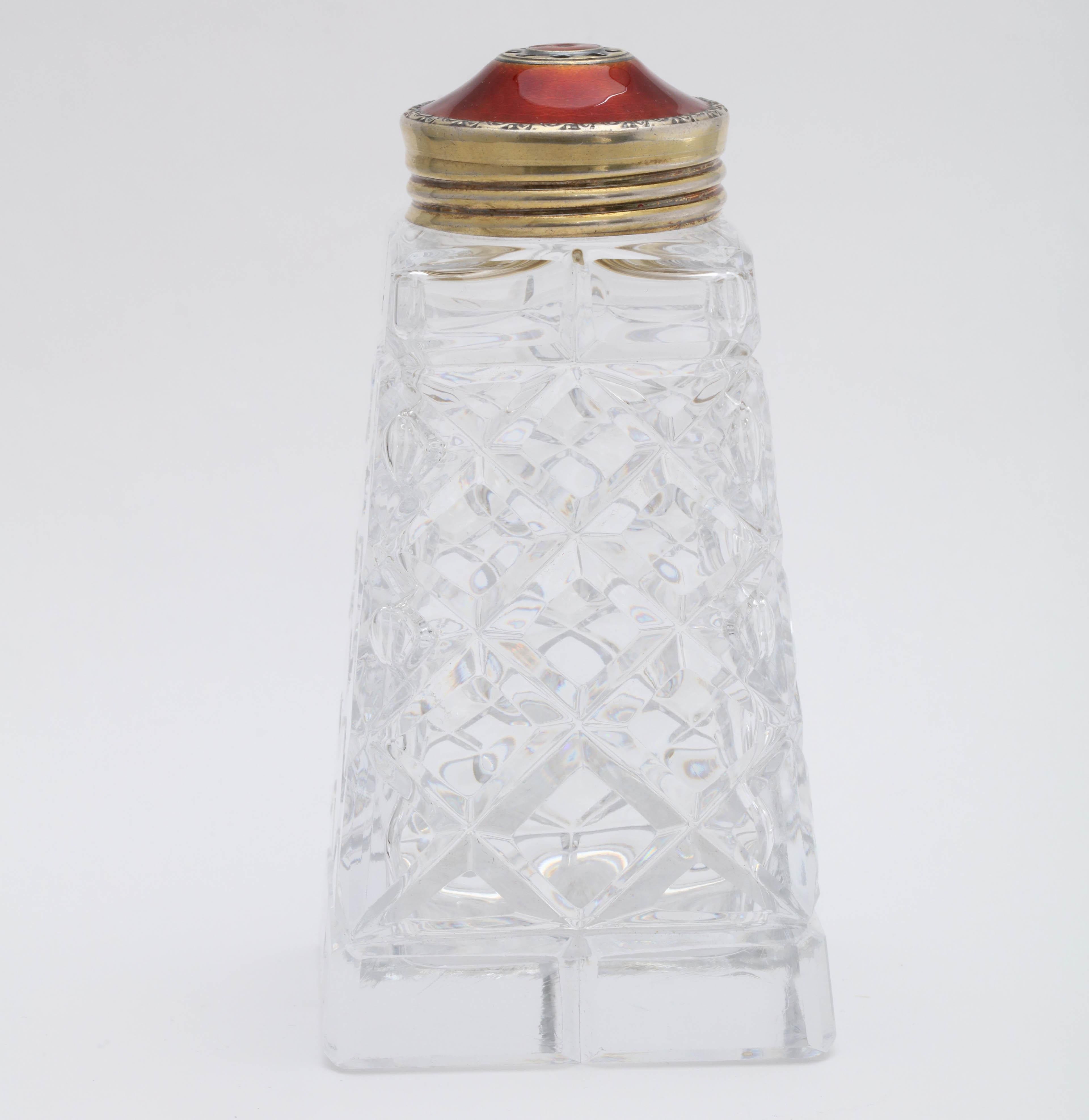 Art Deco, sterling silver-gilt and Red Guilloche enamel - mounted cut crystal sugar shaker, Oslo, Norway, Hroar Prydz - maker (worked from 1859-1937). Measures 5 inches tall 2 1/2 inches wide (at widest point 1/2 inches deep. (at deepest point).