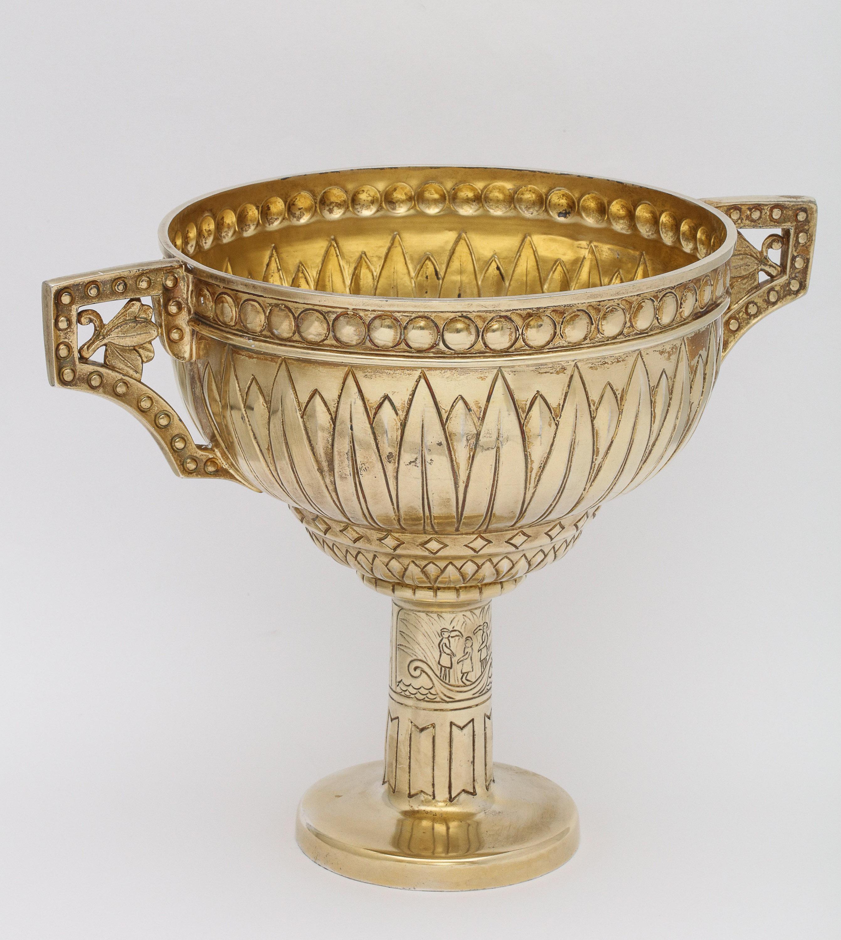 Art Deco, sterling silver-gilt, Egyptian Revival, two-handled centerpiece, inspired by the discovery of King Tut's tomb, Birmingham, England, 1922, Bracker and Sydenham - makers. Measures 7 inches high x 9 1/3 inches wide (handle to handle) x 6 1/4