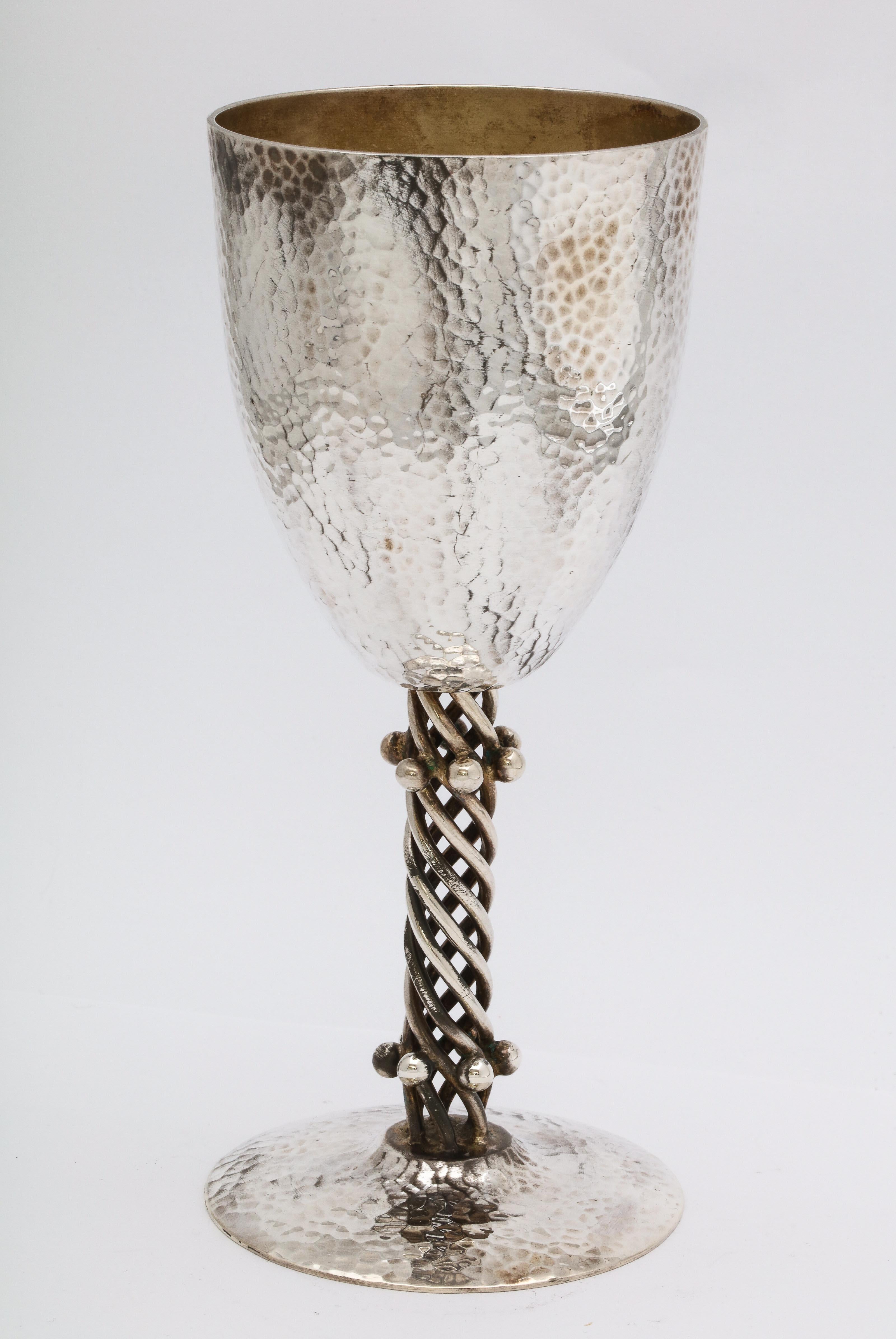 Art Deco, sterling silver, hand-hammered goblet, Mexico, circa 1930s, Los Castillos, maker. Measures 7 1/8 inches high x 3 1/4 inches in diameter across both base and top opening. Weighs 9.575 troy ounces. Hammered design has the effect of making