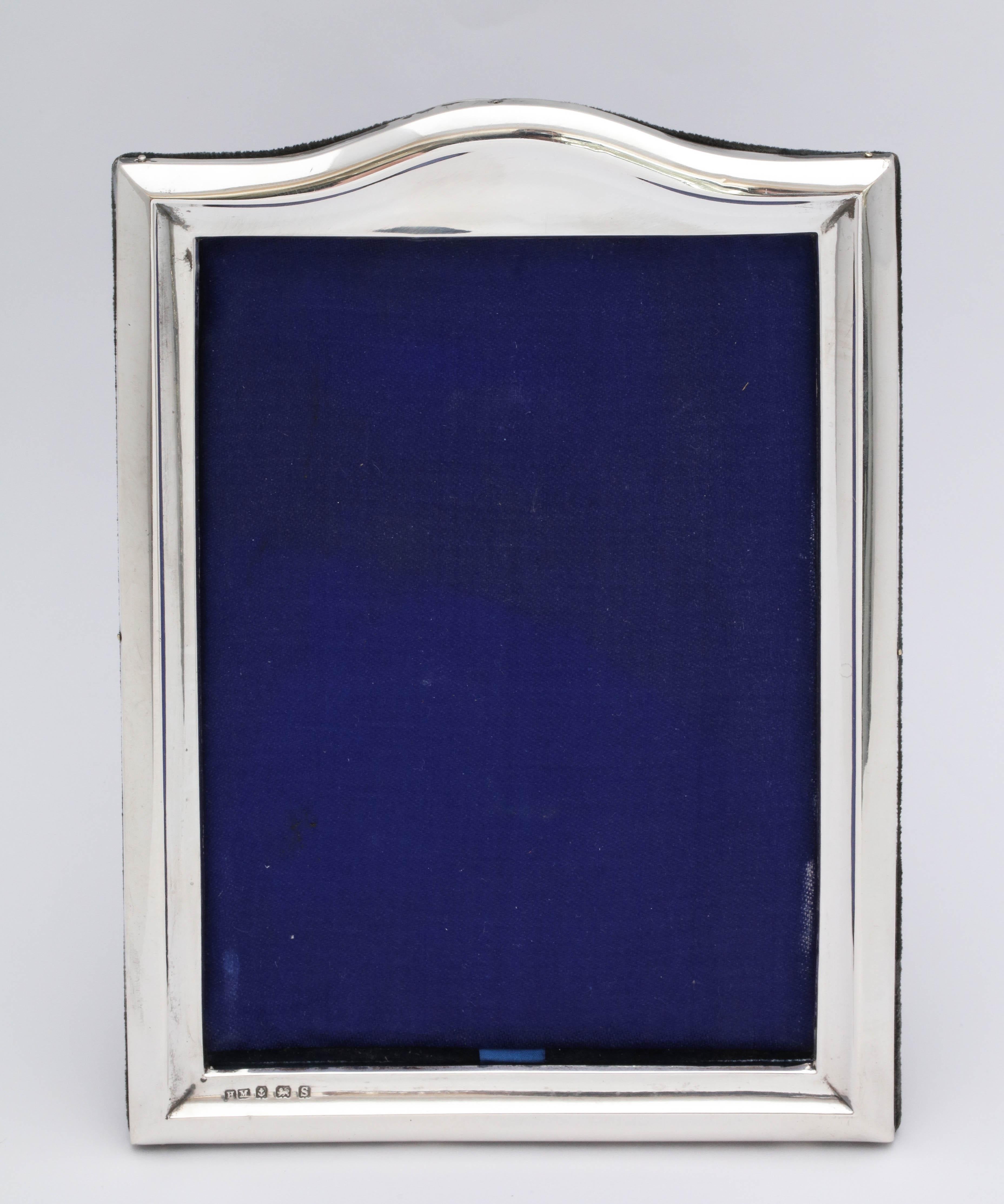 Art Deco, sterling silver, hump-topped picture frame, Birmingham, England, 1917, H. Matthews - maker. Measures 7 inches high (at highest point) x 5 inches wide x 2 1/2 inches deep when easel is fully open. Shows a 4 1/2 inch x 5 1/2 inch photo. Very