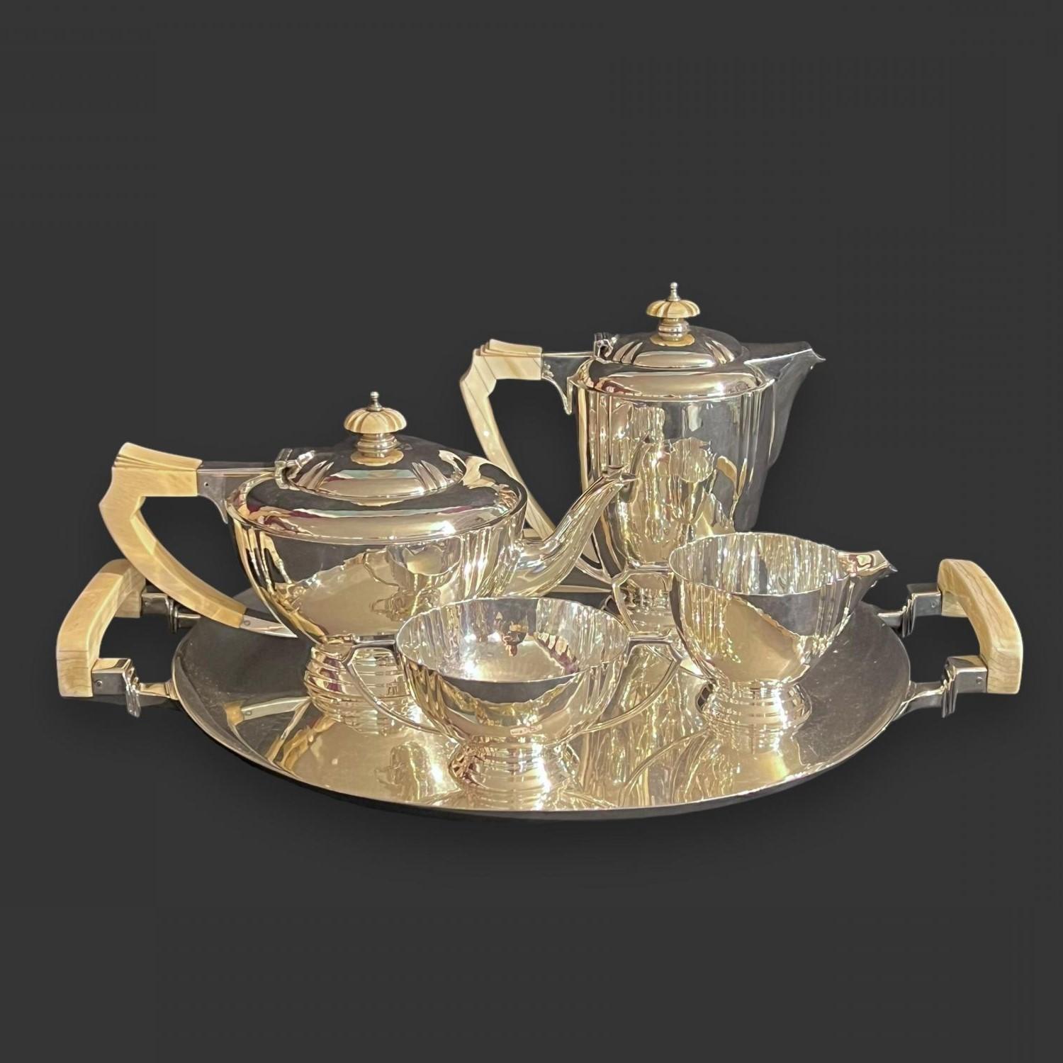 This is an outstanding quality 5 piece silver tea service with a classic streamlined Art Deco form. The whole set has a weight of almost 3.5kg (108 troy. oz.) with each component having a good sturdy feel.
 Every piece has an elongated octagonal