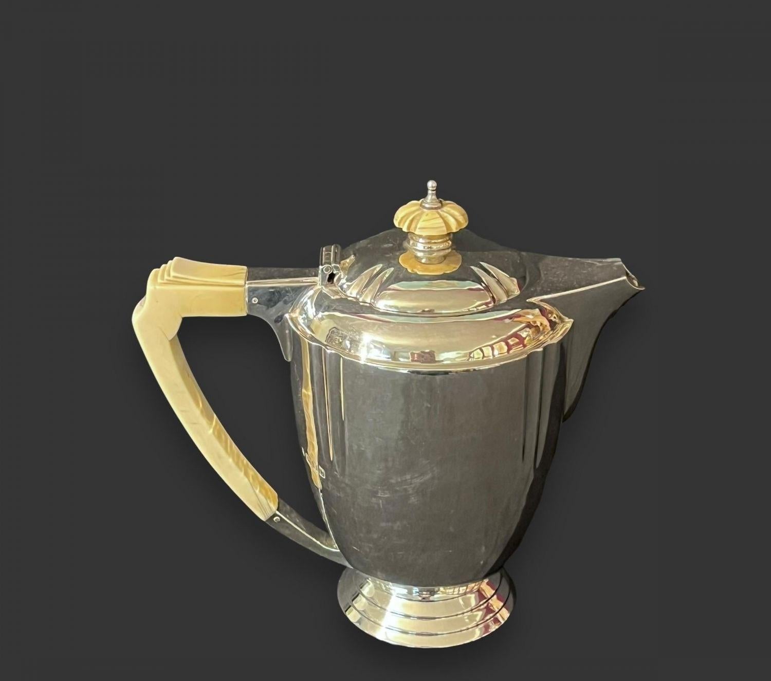 Mid-20th Century Art Deco Sterling Silver & Ivory Tea & Coffee Service & Tray By Ed For Sale