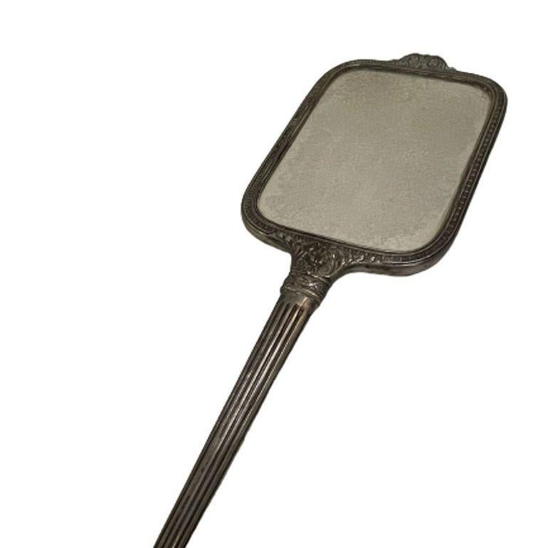 Oirignal 1920s sterling silver mirror and brush set featuring a long-handled mirror with an oval-shaped brush. The mirror has the initials engraved monogram BHB inscribed on the back and the brush has engraved monogram H.

Measurements
mirror:16