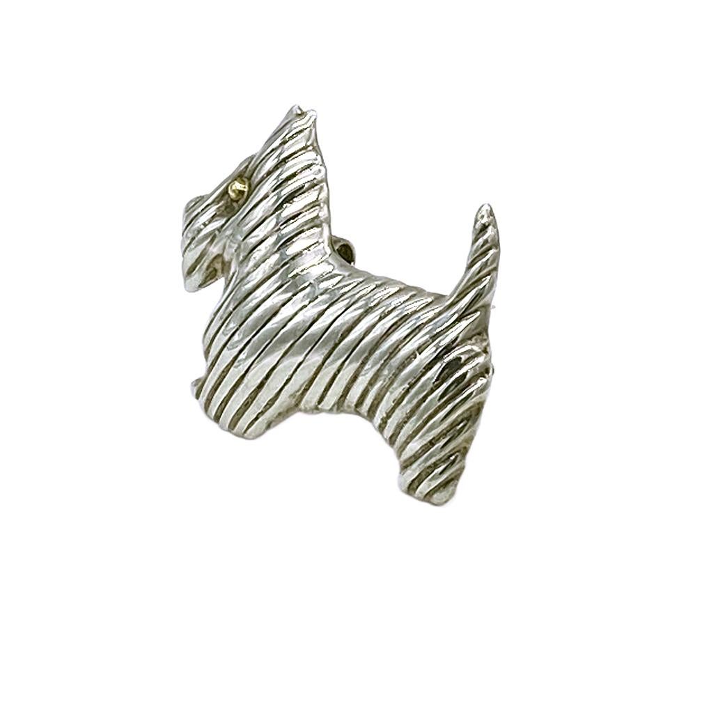 This is a classic sterling silver Scottie brooch or pendant marked MEXICO 925 with Taxco silversmth code TM-17H. The corduroy texture perfectly emulates a well-groomed puppy. This sweet Scottie is currently looking for adoption and would love to go