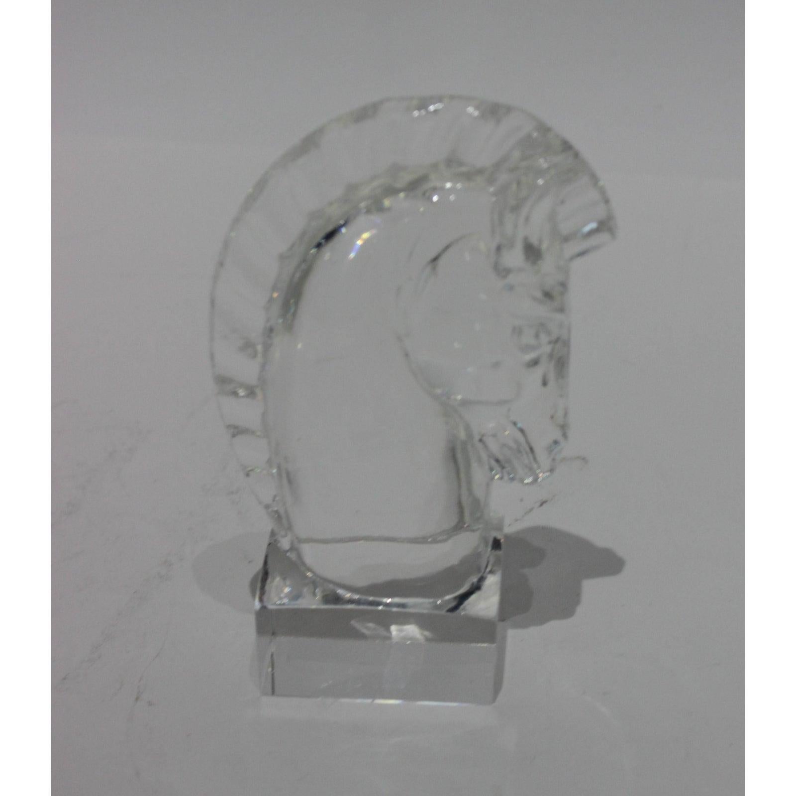 This stylish Art Deco Steuben art glass horse head was designed by Sidney Waugh and the pattern is Madigan #7779. 

Note: Signed on the verso (see photo).