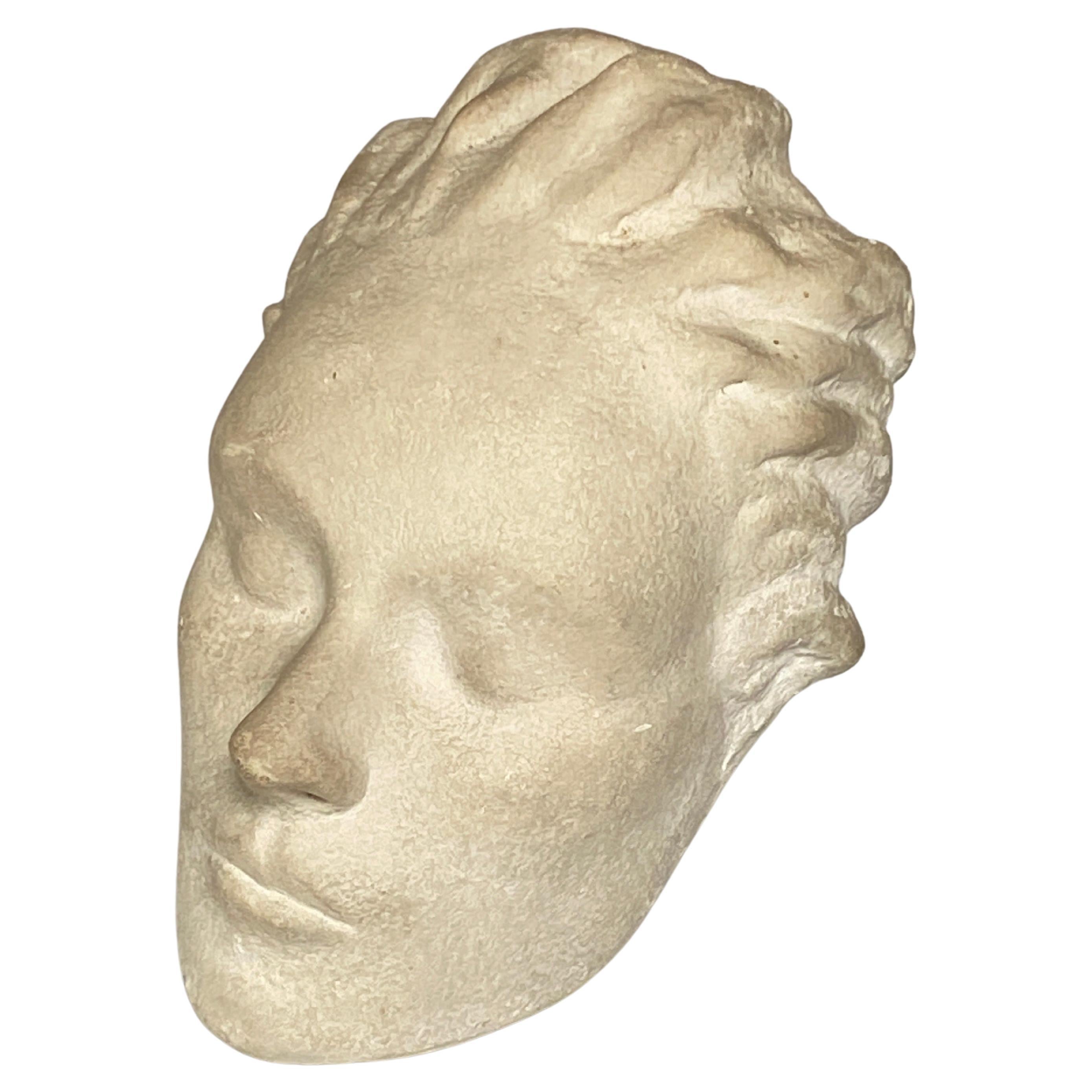 This is an Art Deco Period, Sculpture in stone, representing an women Head.
In a white color. It has been made in France Circa 1940.