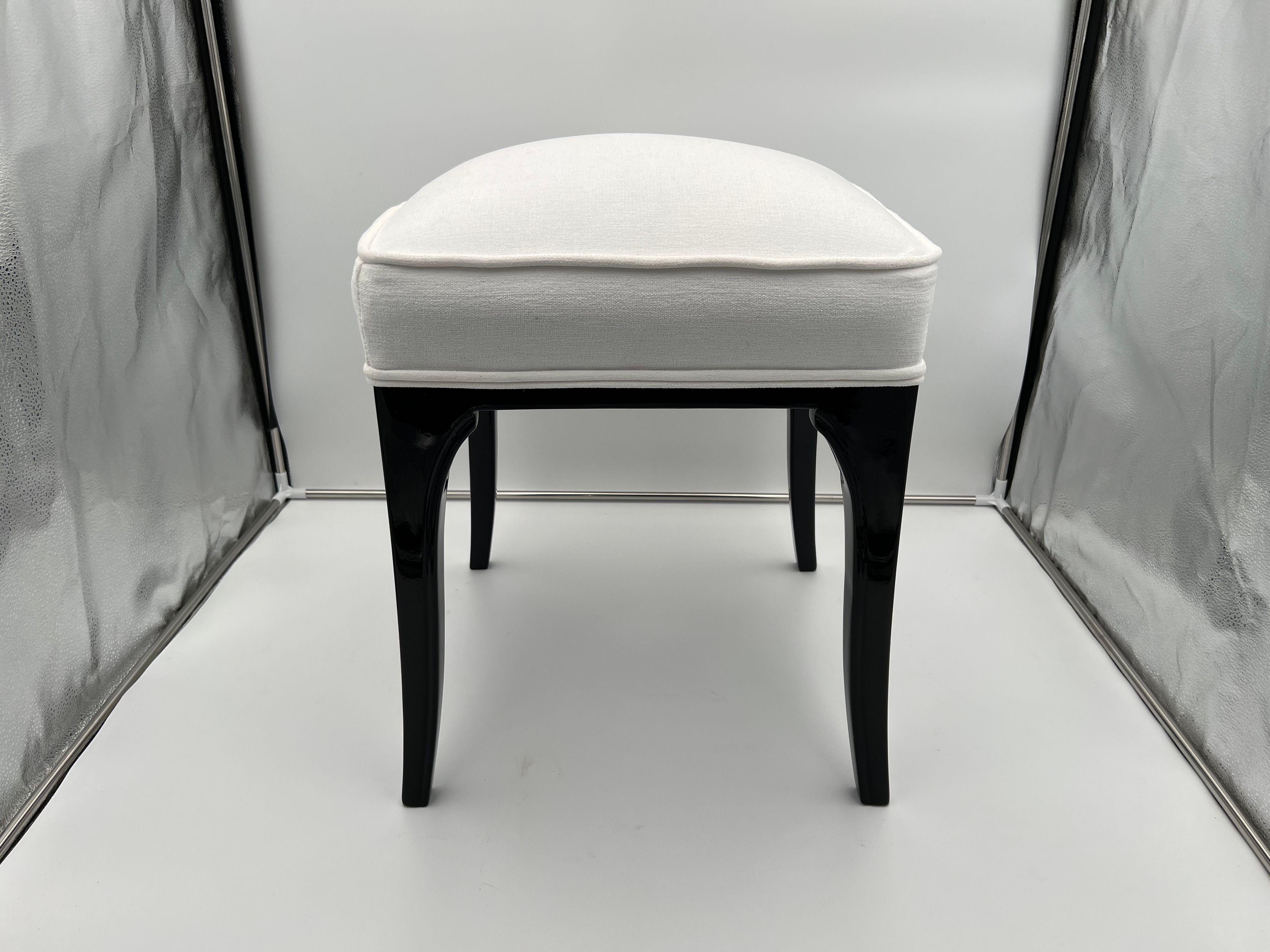 Original Art Deco stool, black lacquered Oak solid wood, France circa 1940

Elegantly curved legs, glossy black piano lacquer. Upholstered with white fabric and double keder.

Dimensions : 
H 51 cm x W 40 cm x D 40 cm
H 20.1 in. x W 15.75 in. x D