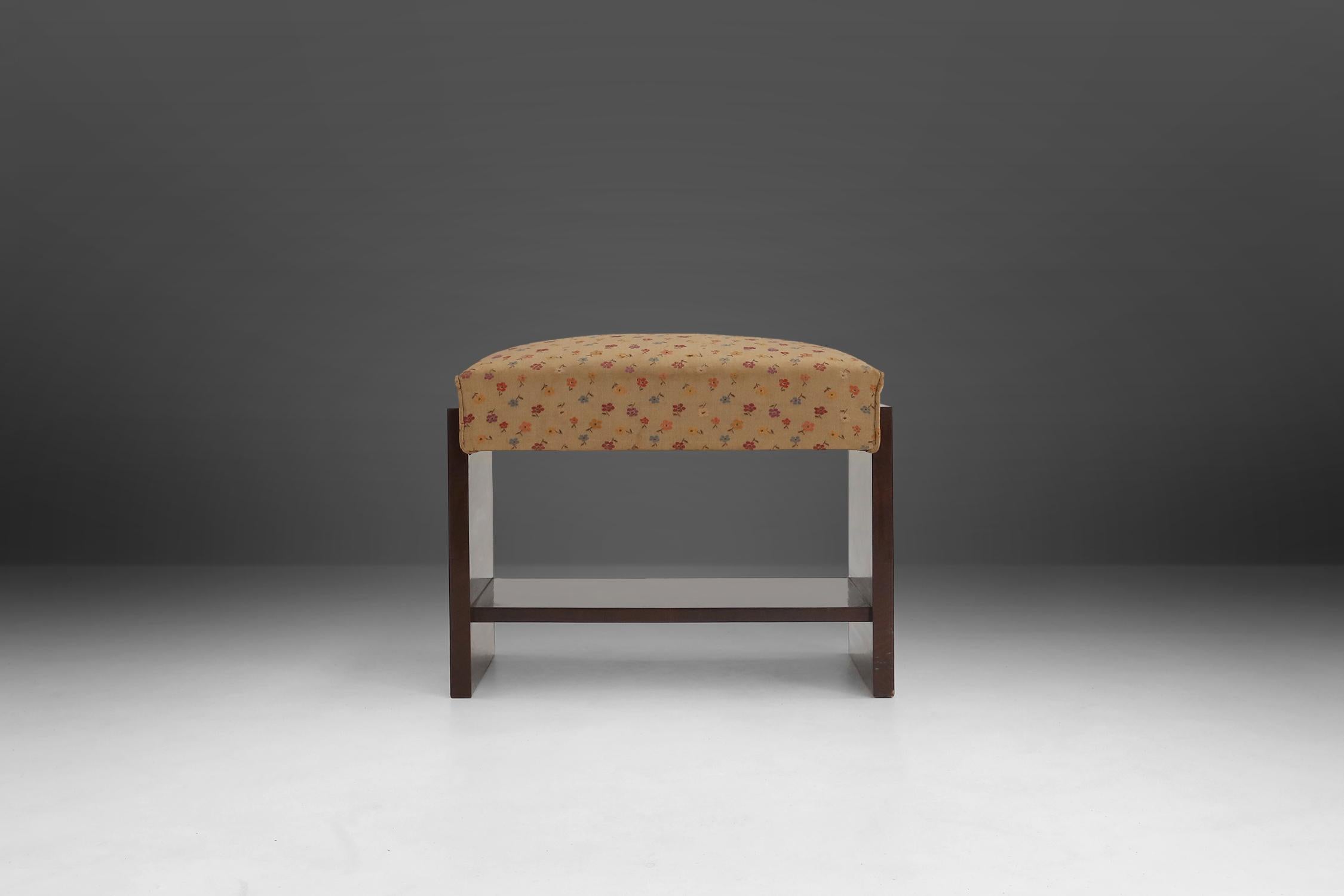 Art Deco stool made of a wooden base and fabric seating with flower pattern.