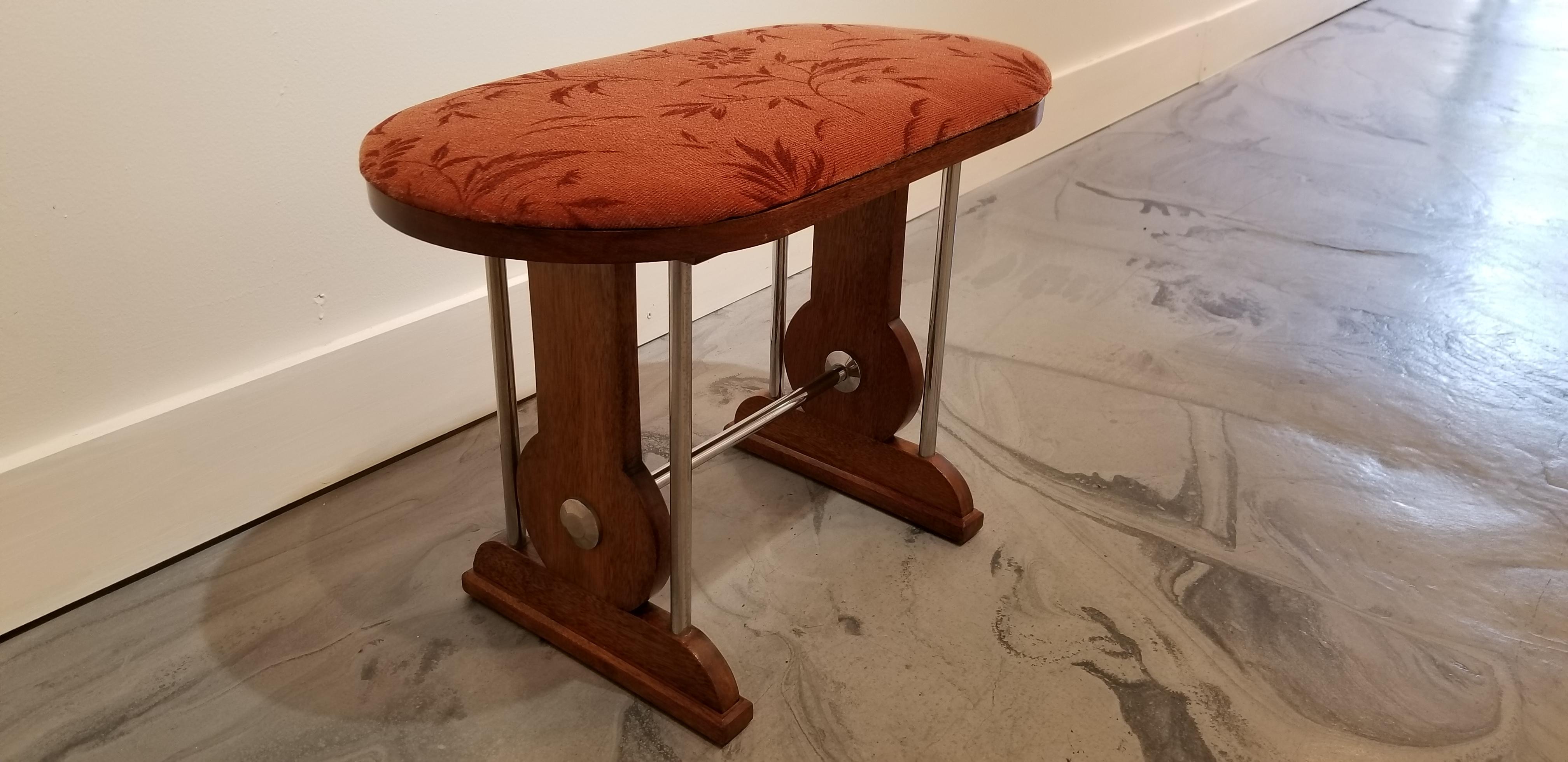 A period Art Deco stool / bench made of solid mahogany with tubular chrome-plated steel detail, Europe, circa 1920s. Excellent original condition.