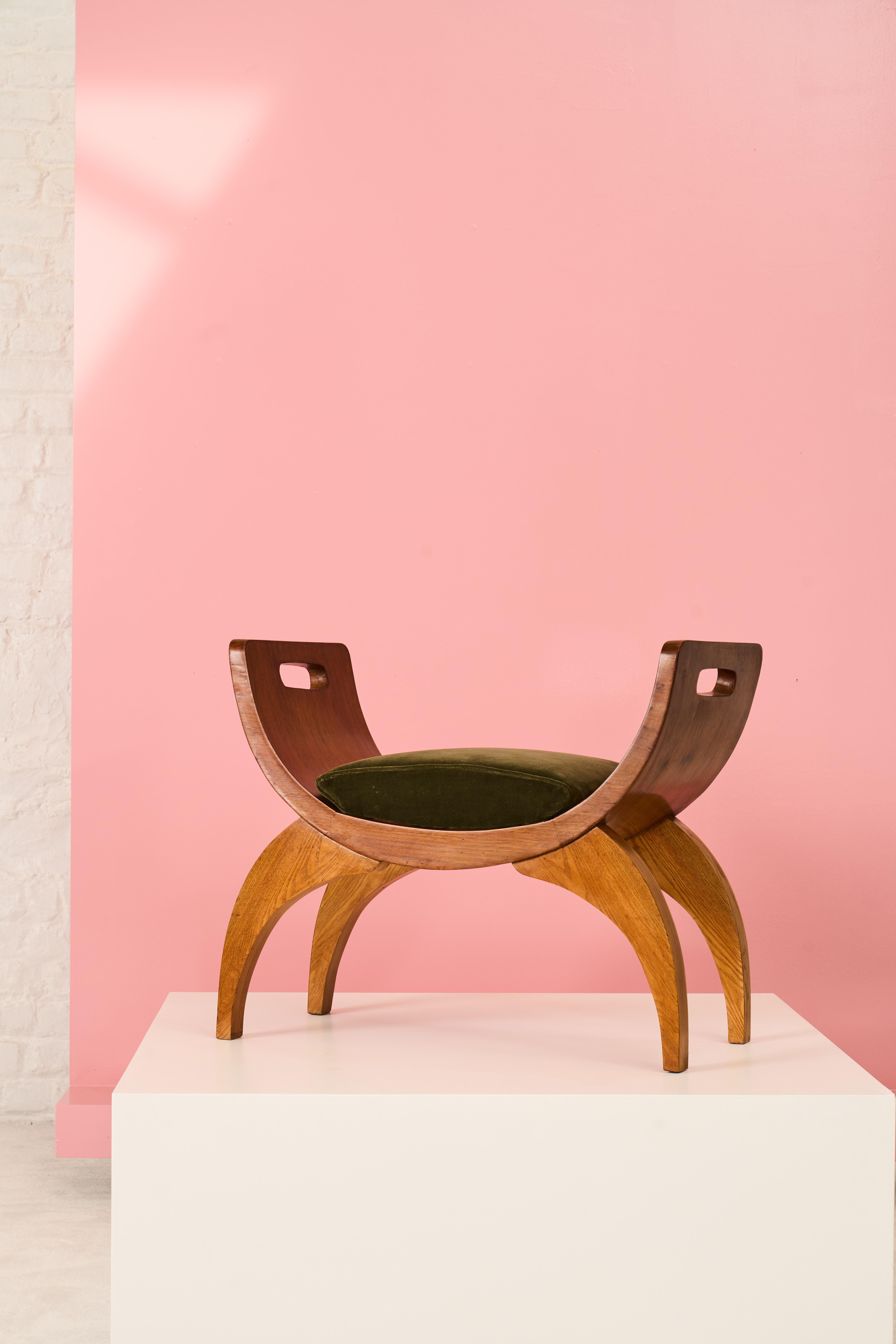 Art deco wooden stool from Czechoslovakia with upholstered cushion.