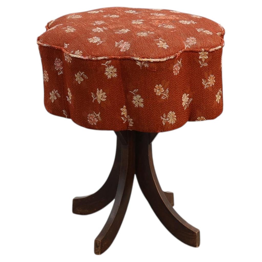 Art deco stool with curved legs and flower form seat with original upholstery