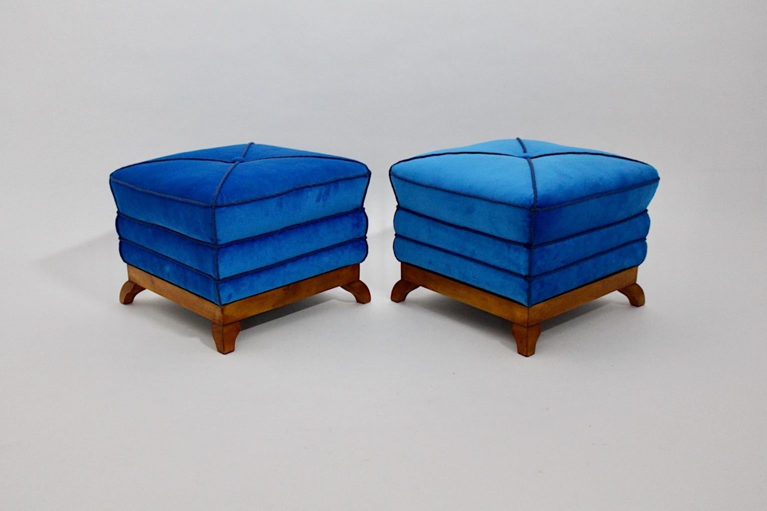 Art Deco vintage pair of stools, poufs or tabouret Dagobert Peche style from maple and blue velvet created and manufactured 1920s Austria.
Wonderful stools in angular form pagoda like reupholstered and refinished, which shows velvet in amazing