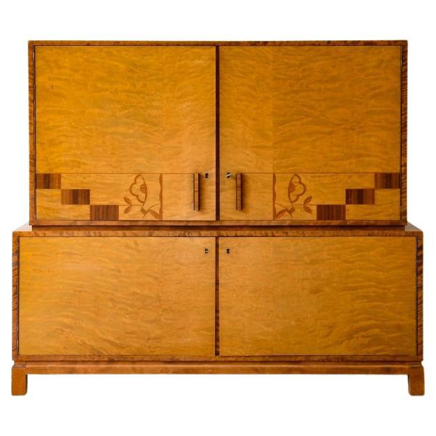 Art Deco storage unit in flamed maple For Sale