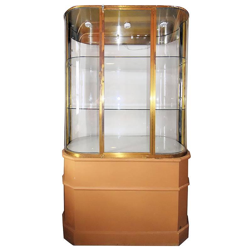 Large pair of free-standing custom Art Deco store display cabinet from the original opening of the world-renowned Bullocks Wilshire in Los Angeles.

The cabinet features a three-tier enclosed bronze and glass display cabinet which rests on a