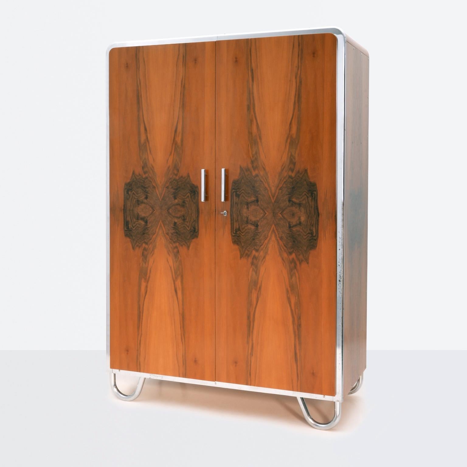 Art Deco- streamline 2-door wardrobe designed by Arch. Hana Kucerová-Záveská (Czech, 1904–1944) and manufactured by Robert Slezák Company, circa 1935. The outstanding form of this wardrobe is the expression of a modern and innovative design as