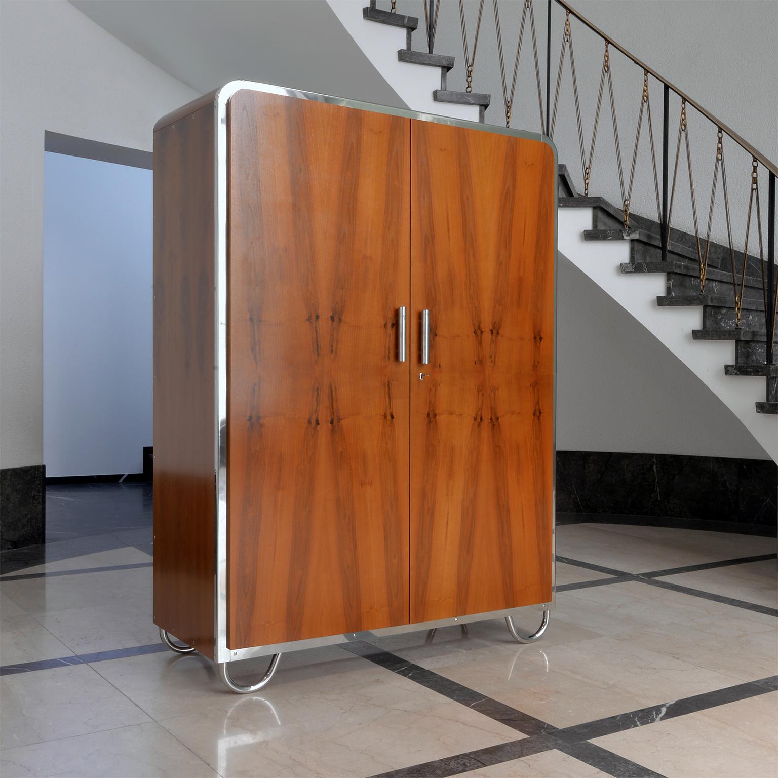 Art Deco- streamline 2-door wardrobe designed by Arch. Hana Kucerová-Záveská (Czech, 1904–1944) and manufactured by Robert Slezák Company, circa 1935. The outstanding form of this wardrobe is the expression of a modern and innovative design as