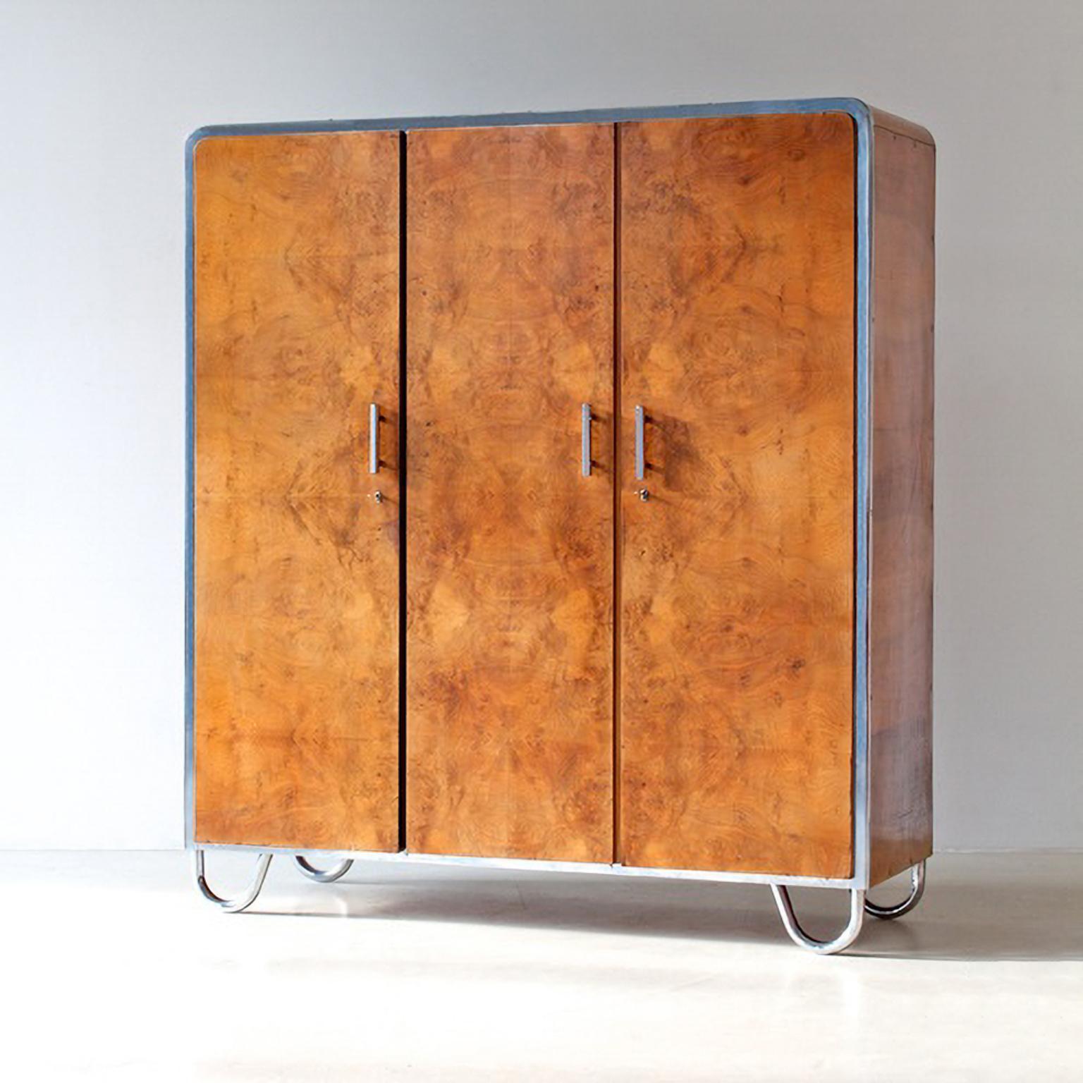 Art Deco- streamline 3-door wardrobe designed by Arch. Hana Kucerová-Záveská (Czech, 1904–1944) and manufactured by Robert Slezák Company, circa 1935. The outstanding form of this wardrobe is the expression of a modern and innovative design as