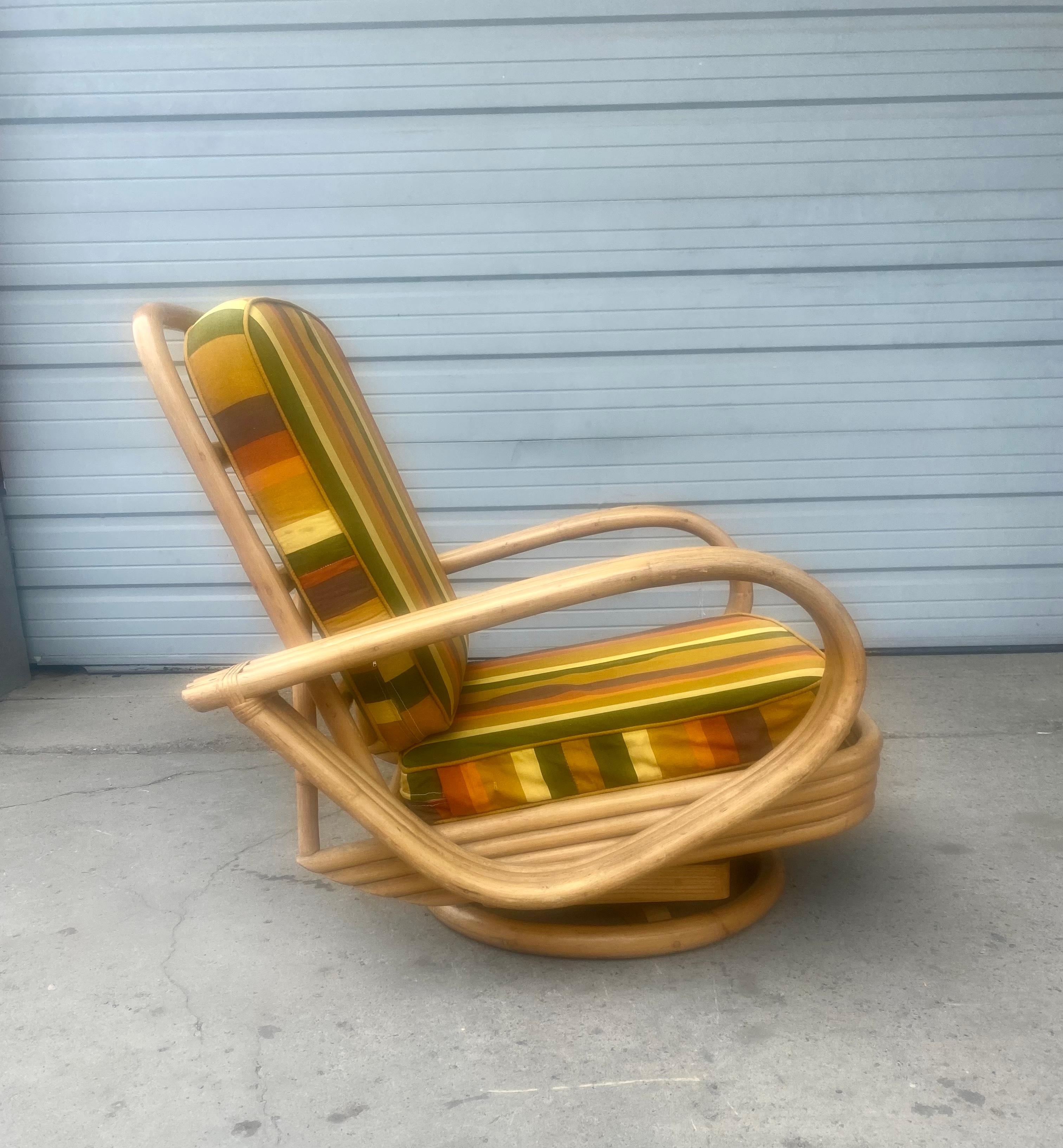 Art Deco / streamline bamboo Tilt/ Swivel platform rocker, tear drop arm. Triple banded bamboo very reminiscent of famed designs by Paul Frankl. Amazing original condition, patina, surface. Extremely comfortable, retains original seat and back