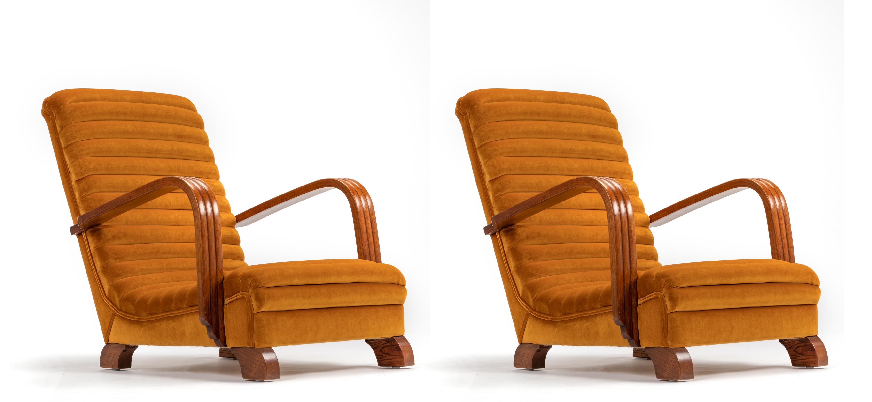 Art Deco streamline lounge chairs by Heals of London circa 1930s

Truly stunning and unique pair of fully restored oak framed original 1930s 'Streamline Moderne' Art Deco Club lounge chairs sold by Heals of London circa 1930, traditionally