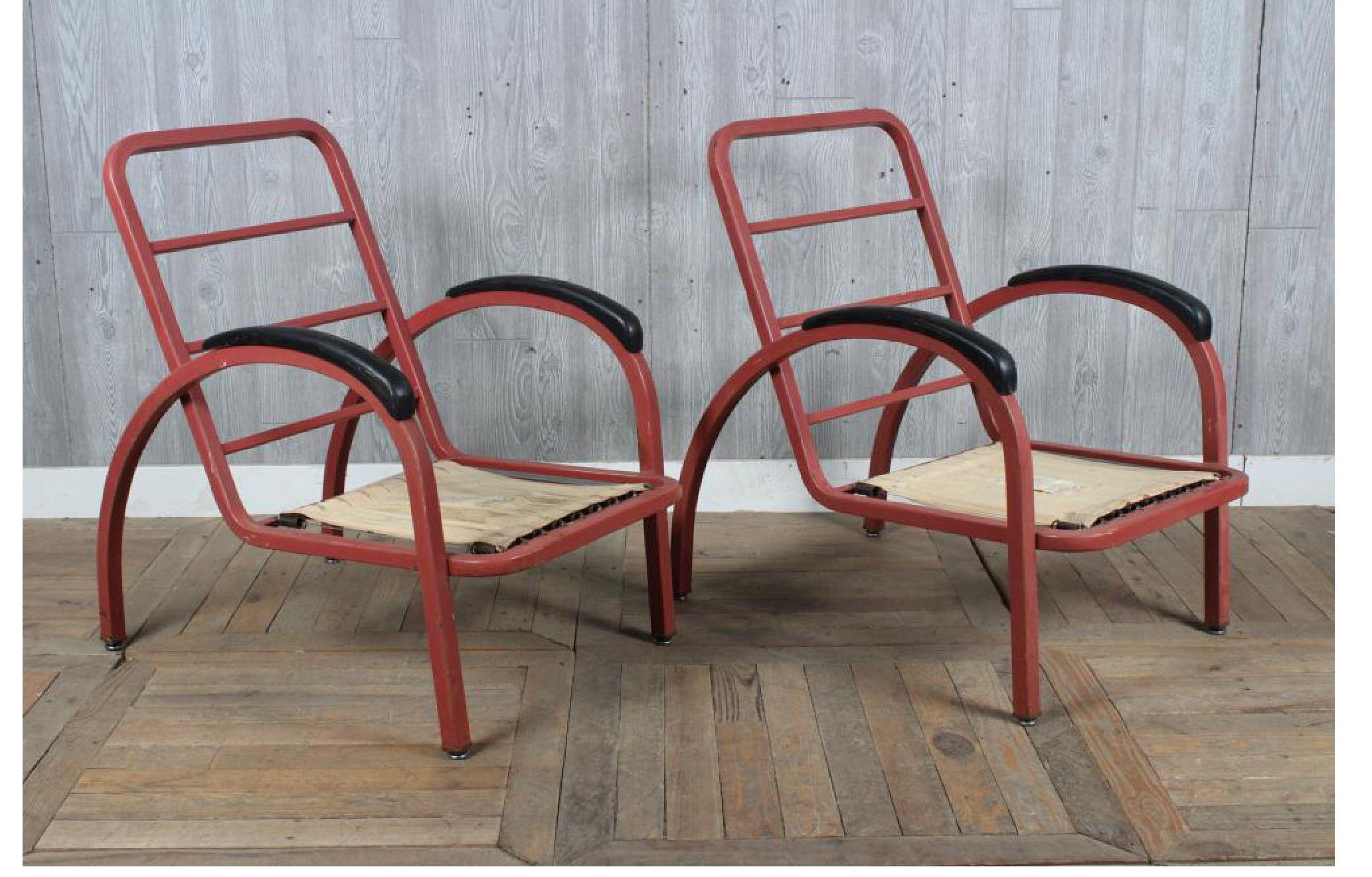 Rare set of enameled steel lounge chairs designed by Norman Bel Geddes in 1929. The Simmons Company enjoyed a reputation as the leading seller of steel furniture throughout the interwar years (1920s-1930s), having introduced the first metal bedroom