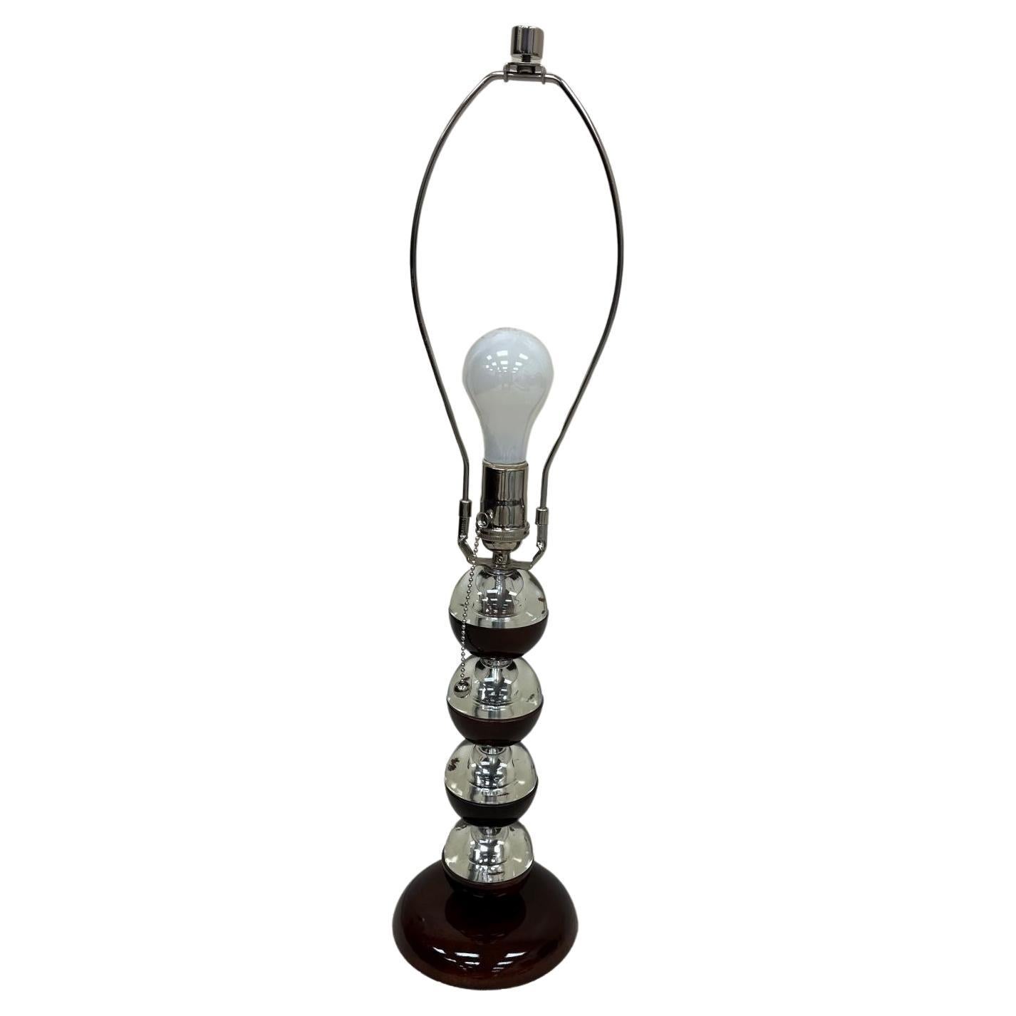 Polished Art Deco Streamline Walnut And Solid Glass Table Lamp American Circa 1930’s For Sale