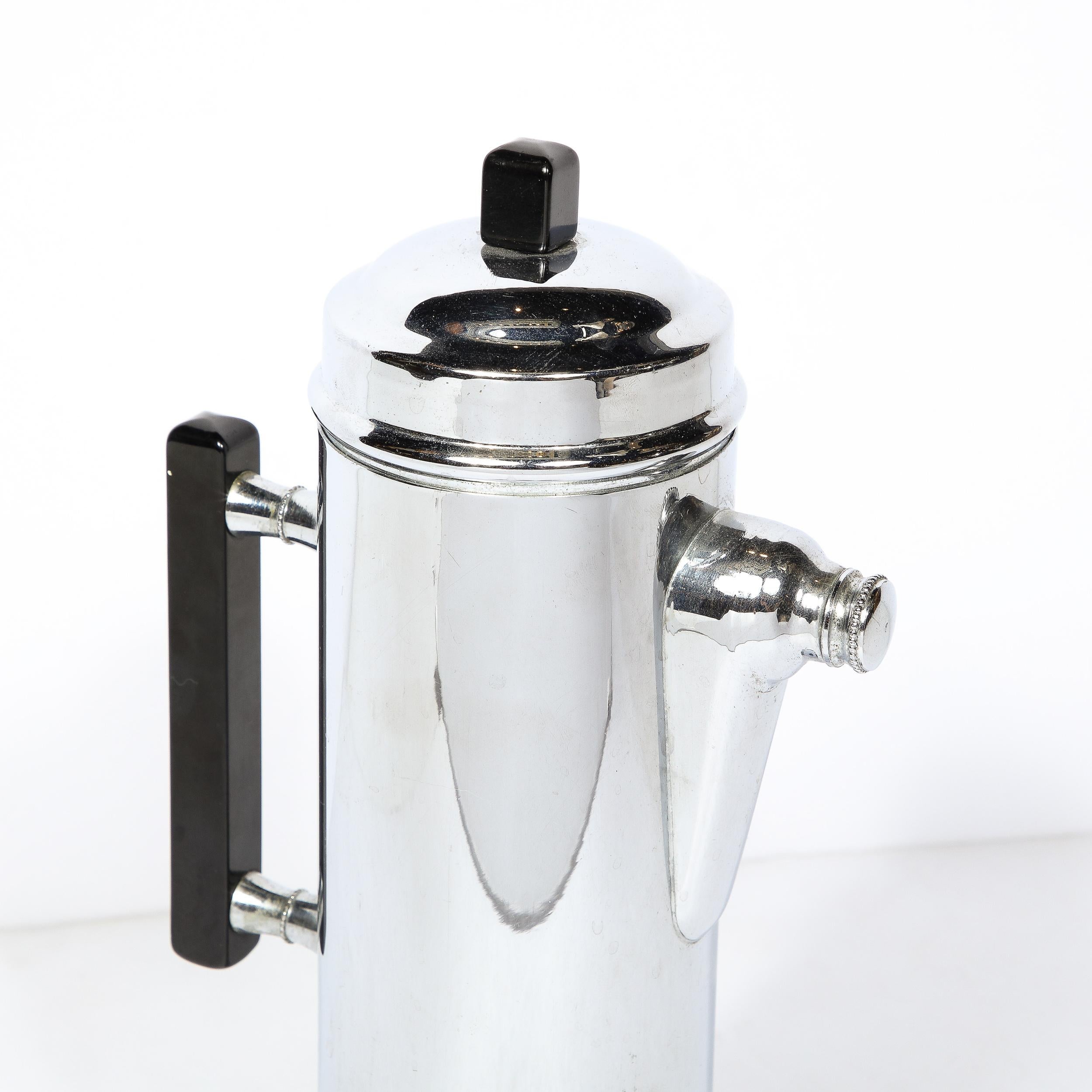 Mid-20th Century Art Deco Streamlined Cocktail Shaker in Chrome with Black Bakelite Handles For Sale