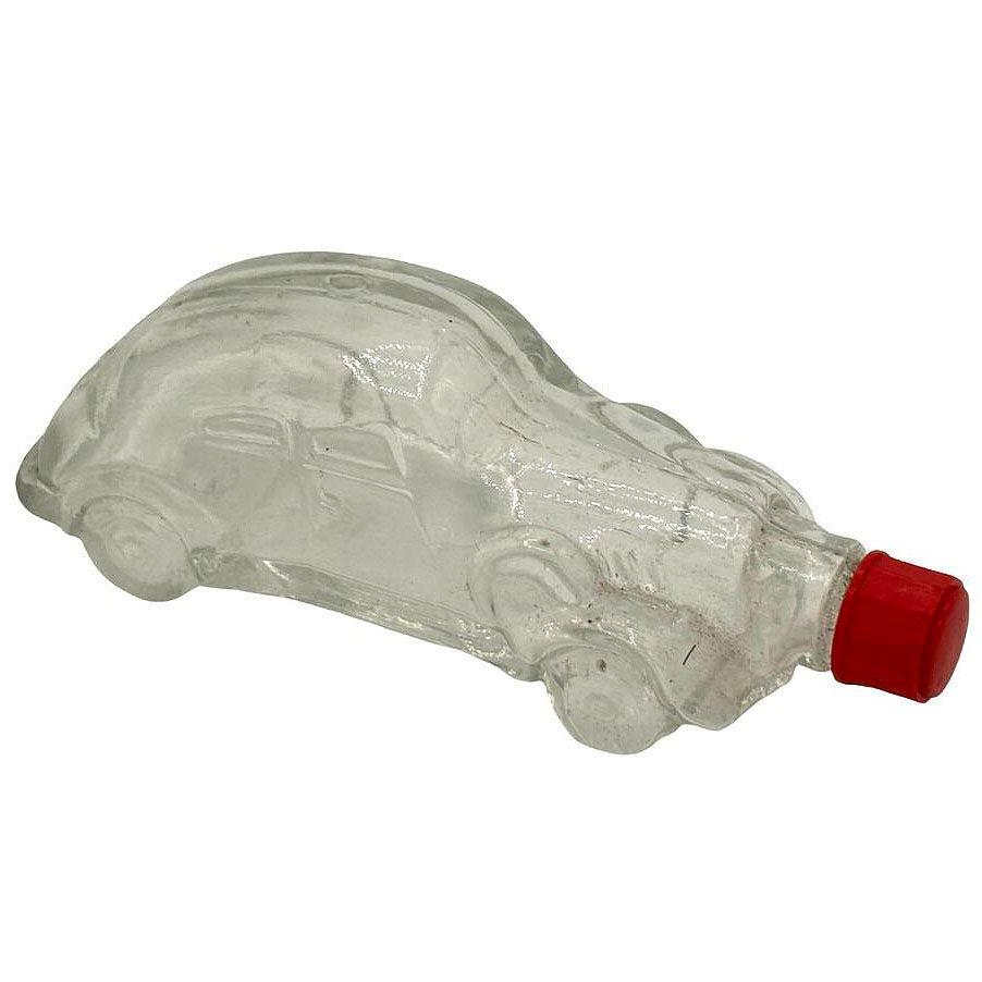 Questo set di sei piccole bottiglie di profumo per auto in vetro vintage con un design Streamline Art Deco. Ogni bottiglia multiuso mostra la silhouette di una classica Studebaker, completa di dettagli raffinati come le ruote e le griglie stampate,