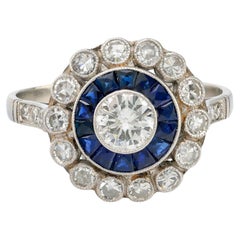 Art Deco style 0.35 carat diamond sapphire platinum target ring