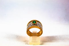 Anillo de cóctel de oro amarillo estilo art déco con esmeralda de 0,60 quilates y diamante de 0,50 quilates