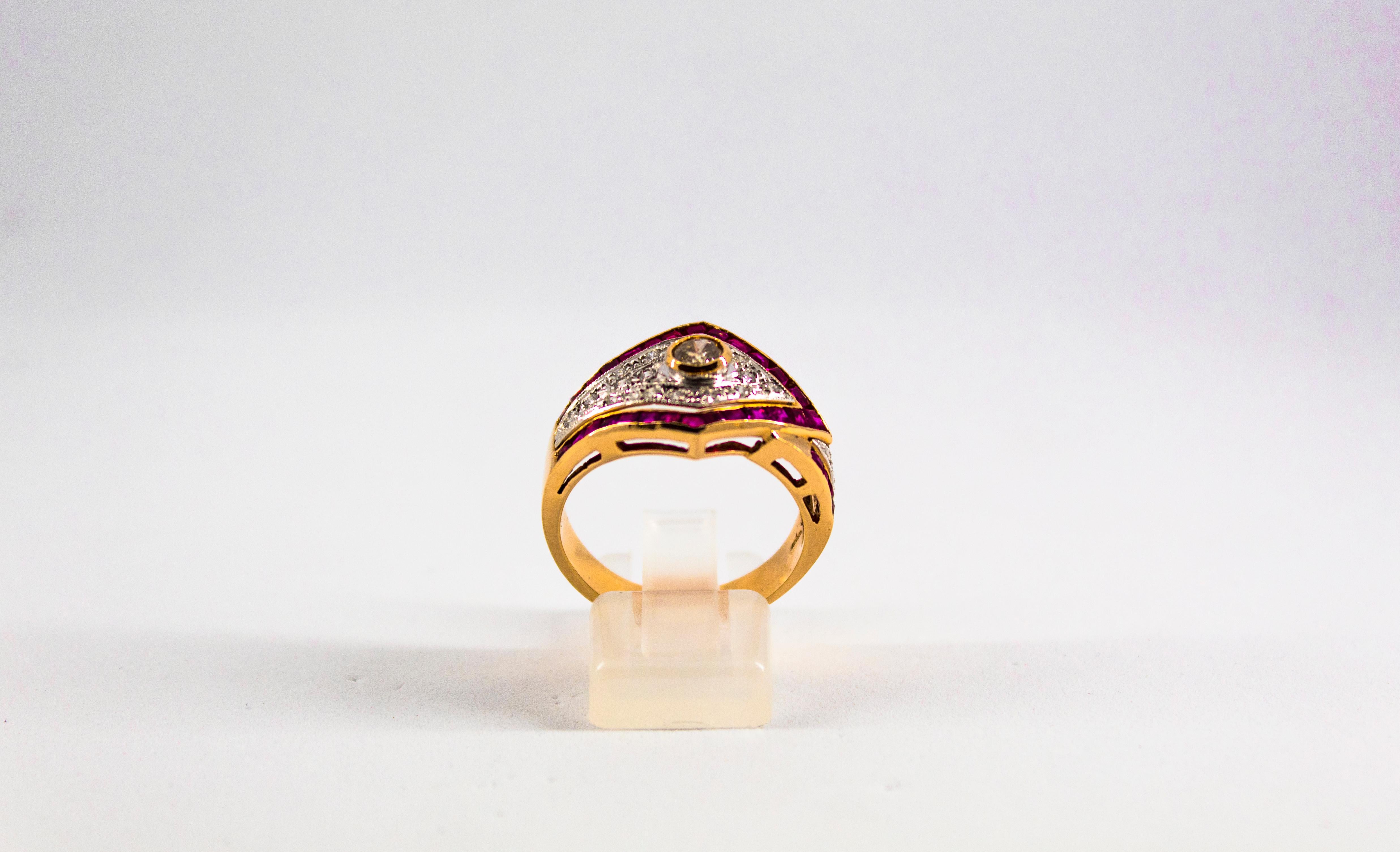 This Ring is made of 14K Yellow Gold.
This Ring has 0.60 Carats of White Brilliant Cut Diamonds.
This Ring has 1.53 Carats of Rubies.

Size ITA: 12 1/2 USA: 6 1/4

We're a workshop so every piece is handmade, customizable and resizable.