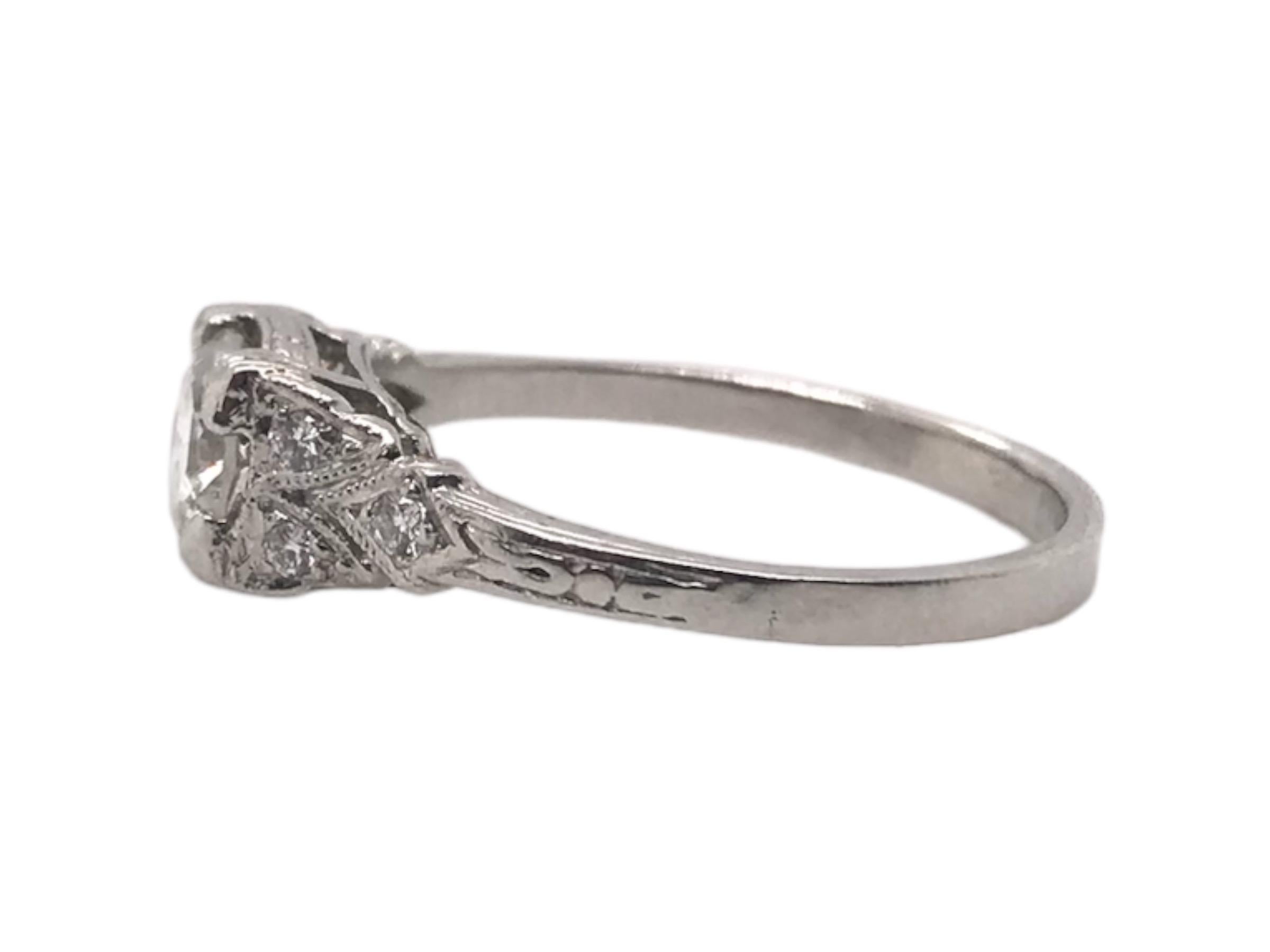 Women's Art Deco Style 0.65 Carat Platinum Diamond Engagement Ring For Sale