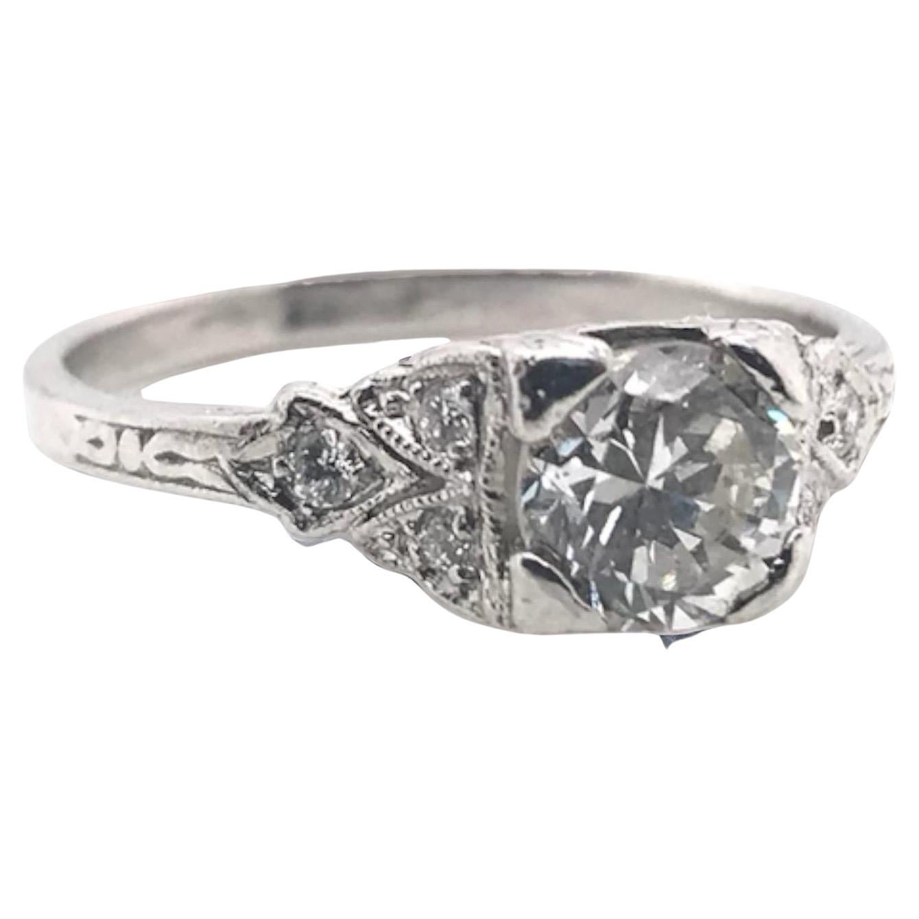 Art Deco Style 0.65 Carat Platinum Diamond Engagement Ring For Sale