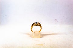 Art Deco Style 0.75 Carat White Rose Cut Diamond Blue Sapphire Yellow Gold Ring