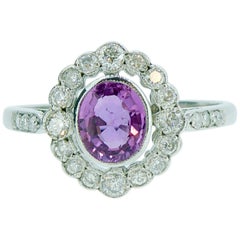 Art Deco Style 0.78 Carat Pink Sapphire Cluster Ring in Diamond Halo Surround
