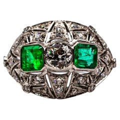 Retro Art Deco Style 0.99 Carat White Diamond 0.85 Carat Emerald White Gold Ring