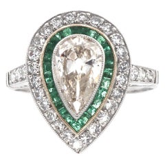 Art Deco Style 1 Carat Old Pear Shaped Diamond and Emerald Platinum Ring