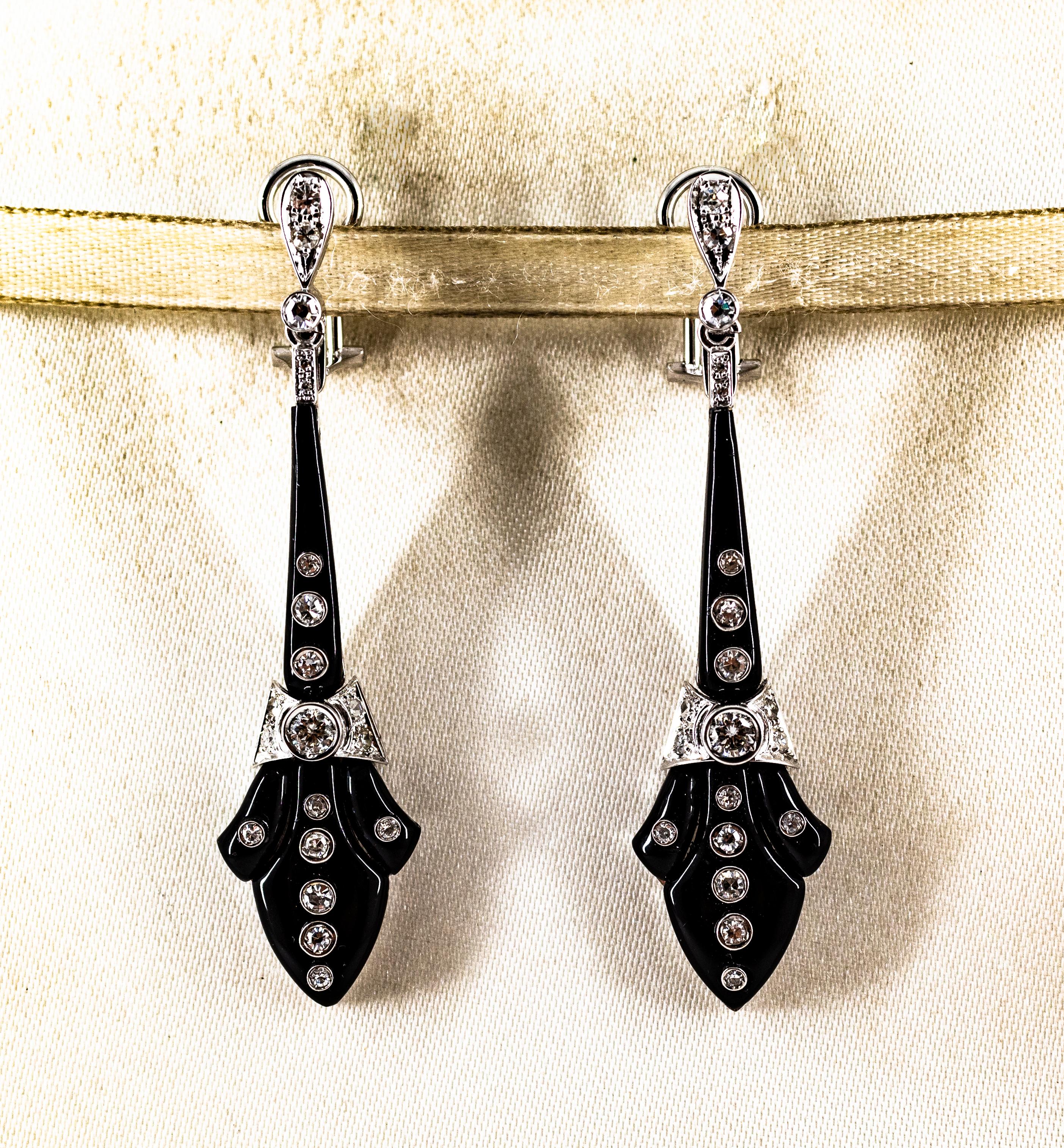 These Earrings are made of 14K White Gold.
These Earrings have 1.00 Carats of White Modern Round Cut Diamonds.
These Earrings have Onyx.
These Earrings are inspired by Art Deco.

All our Earrings have pins for pierced ears but we can change the