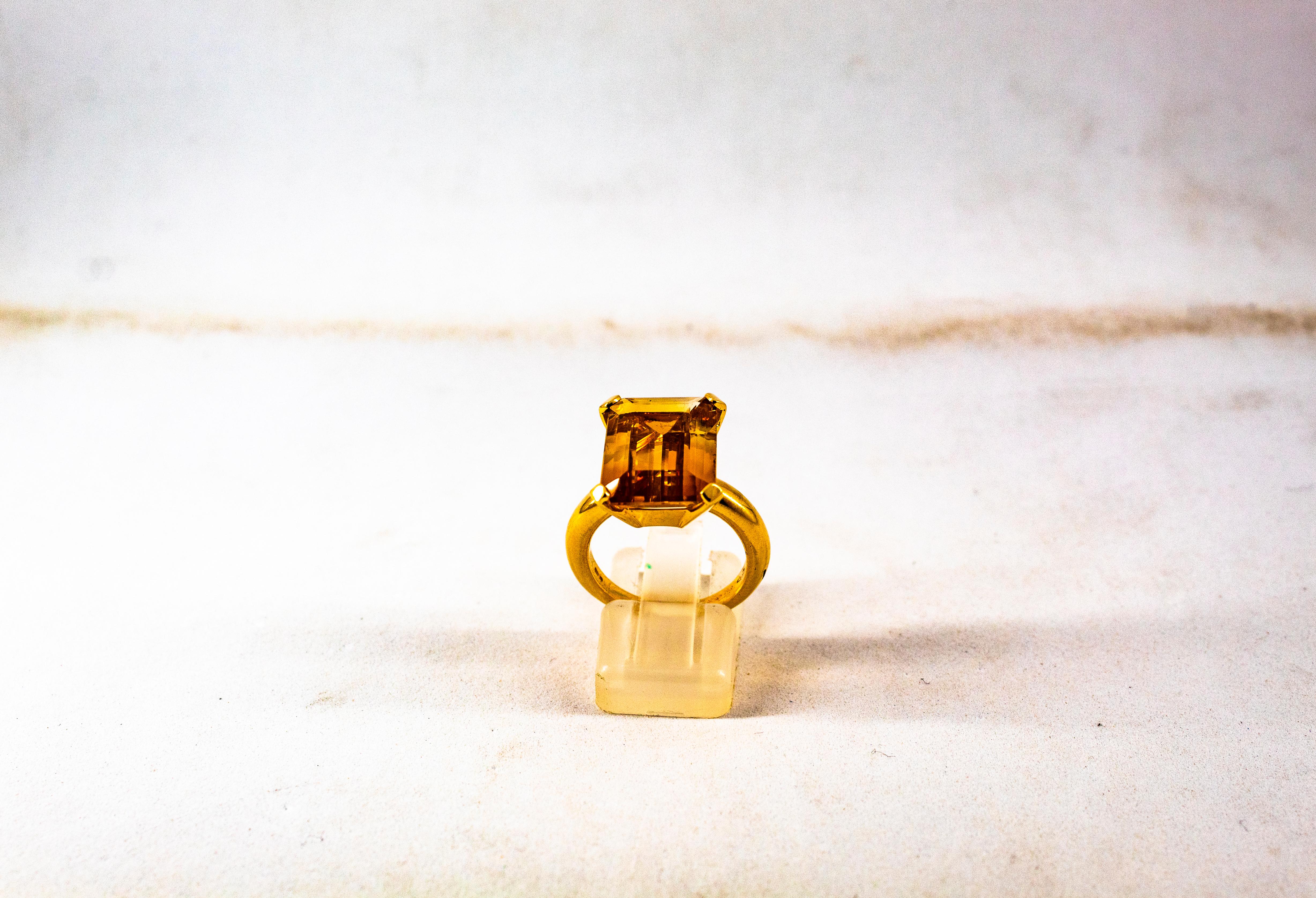 This Ring is made of 9K Yellow Gold.
This Ring has a 10.00 Carats Natural Citrine.
This Ring is inspired by Art Deco.

This Ring is available also in 14 or 18K Yellow or White Gold.
This Ring is available also with Amethyst or Blue Topaz.

Size ITA: