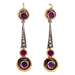 Boucles d
oreilles à levier en or jaune de style Art déco avec rubis et diamants blancs de 1.10 carat